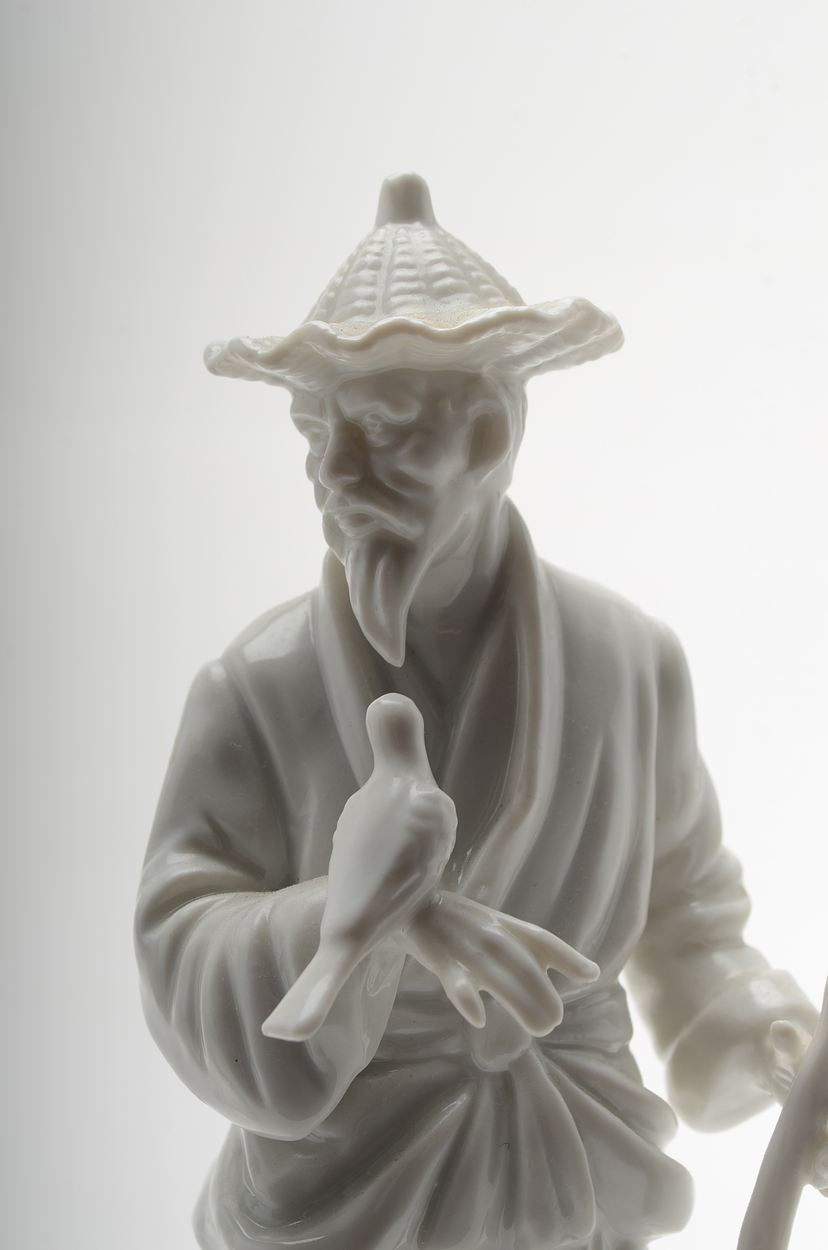 Four "Fitz and Floyd" White Porcelain Chinese Figures