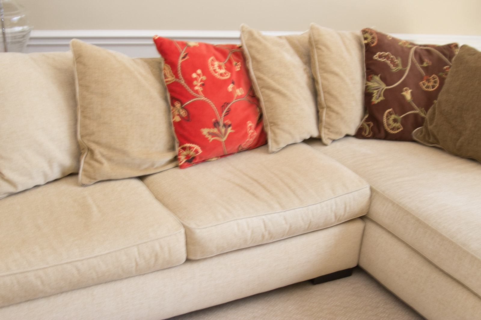 Upholstered Arhaus Sectional Sofa with Decorative Pillows