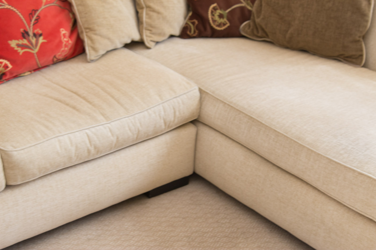 Upholstered Arhaus Sectional Sofa with Decorative Pillows