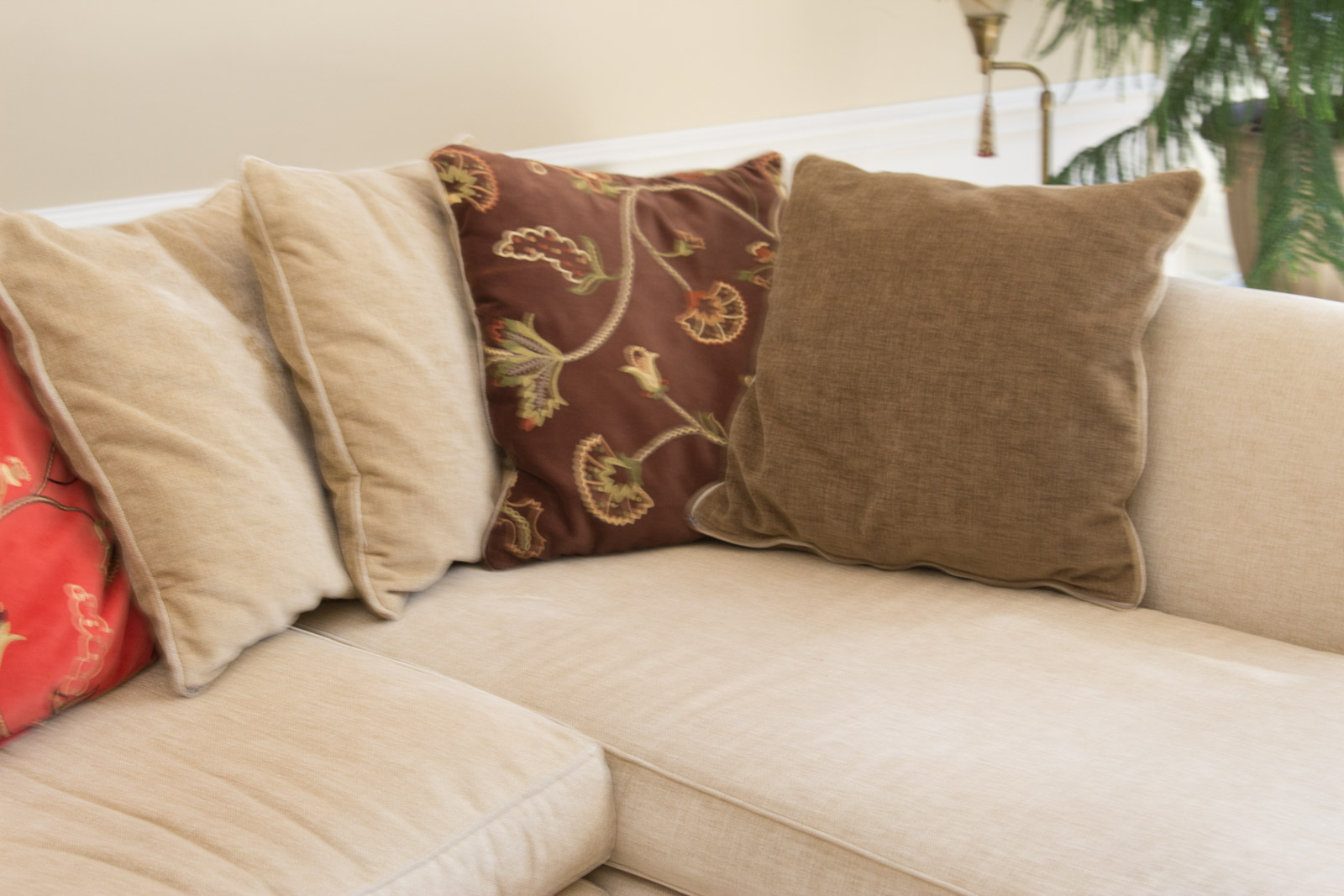 Upholstered Arhaus Sectional Sofa with Decorative Pillows