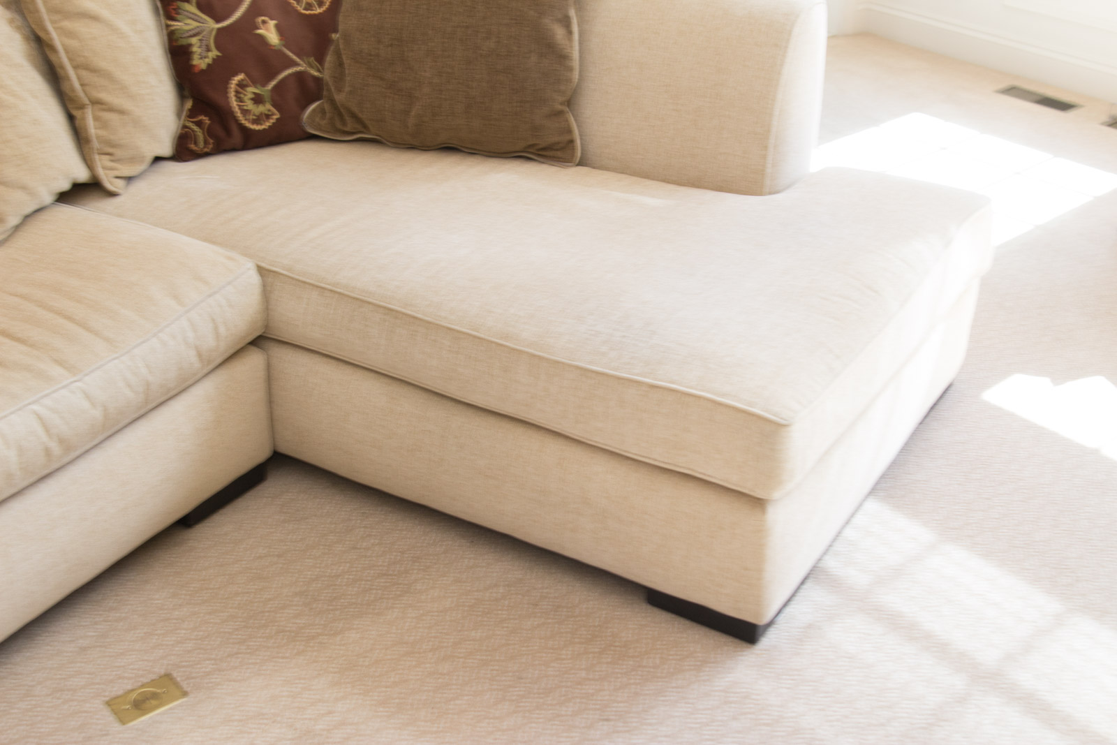 Upholstered Arhaus Sectional Sofa with Decorative Pillows