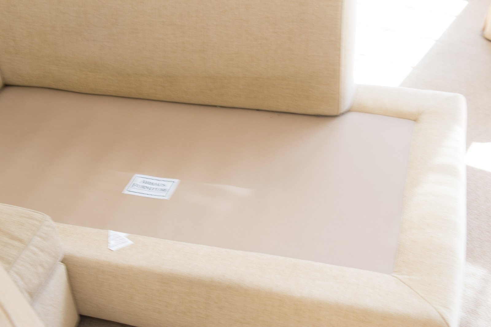 Upholstered Arhaus Sectional Sofa with Decorative Pillows