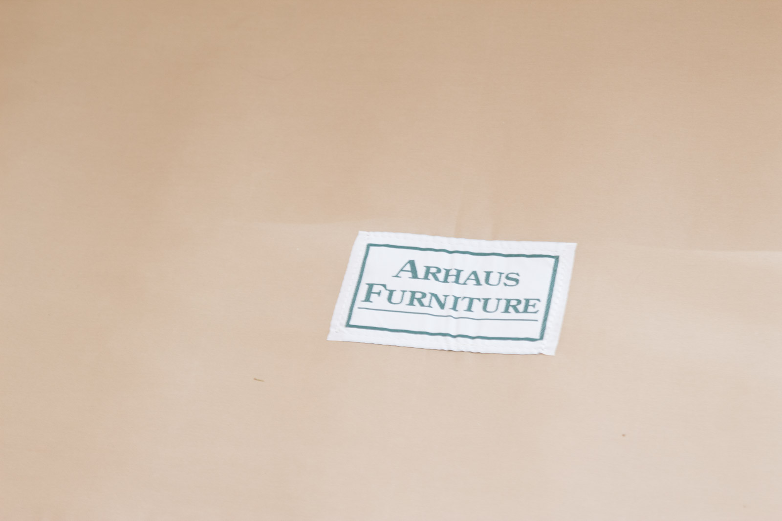 Upholstered Arhaus Sectional Sofa with Decorative Pillows