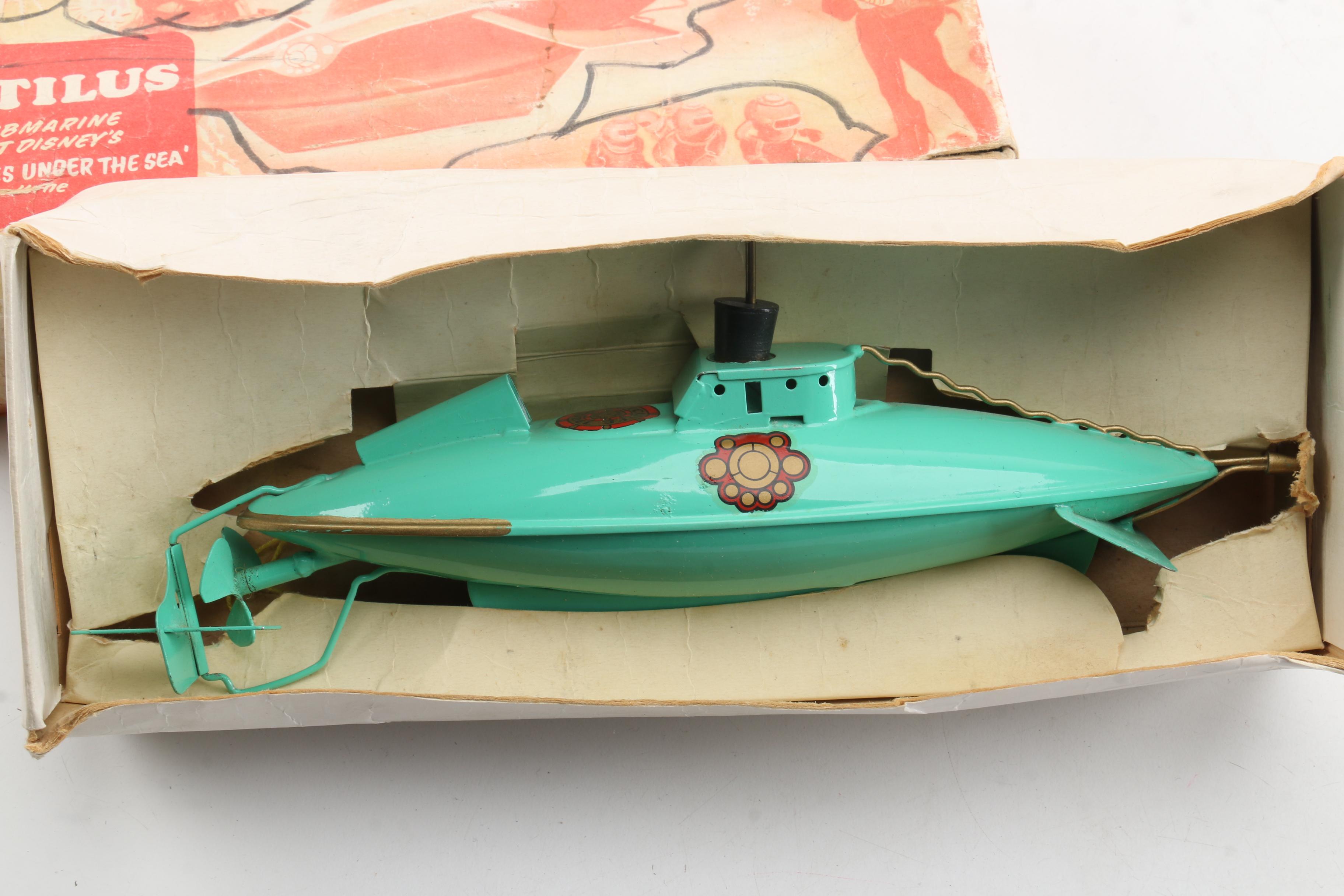 Vintage Sutcliffe Nautilus Submarine Wind-Up Toy and Other Disney Collectibles