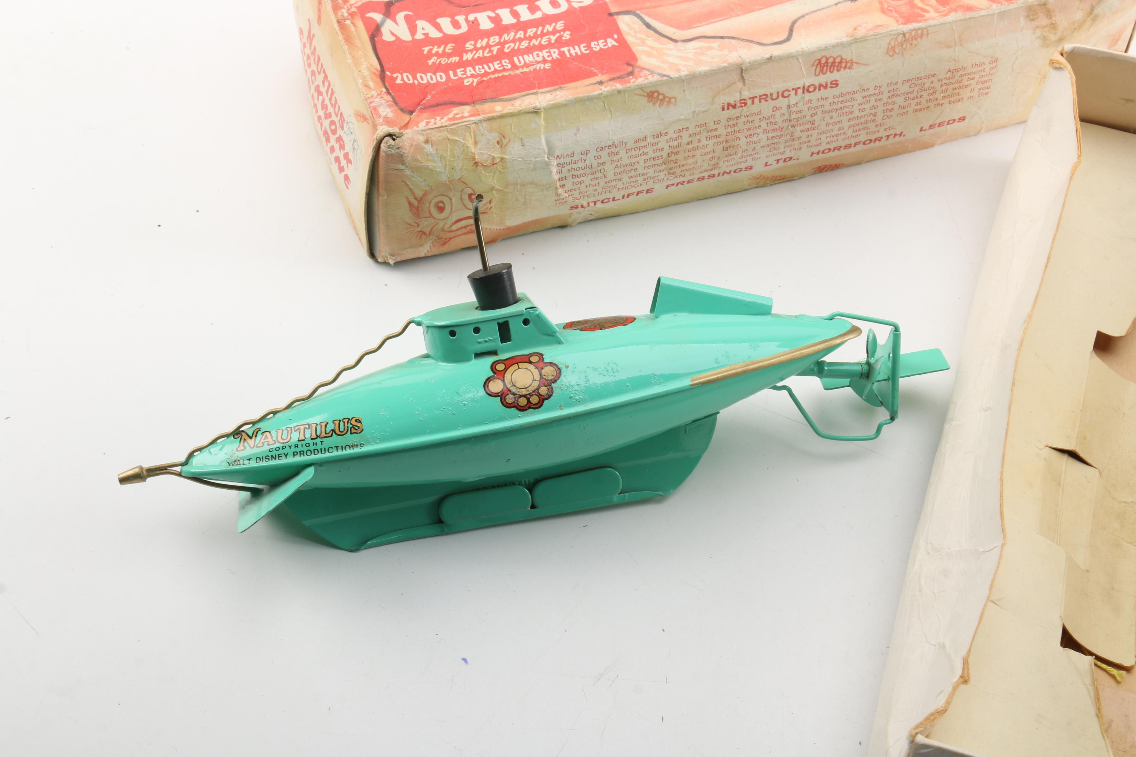 Vintage Sutcliffe Nautilus Submarine Wind-Up Toy and Other Disney Collectibles