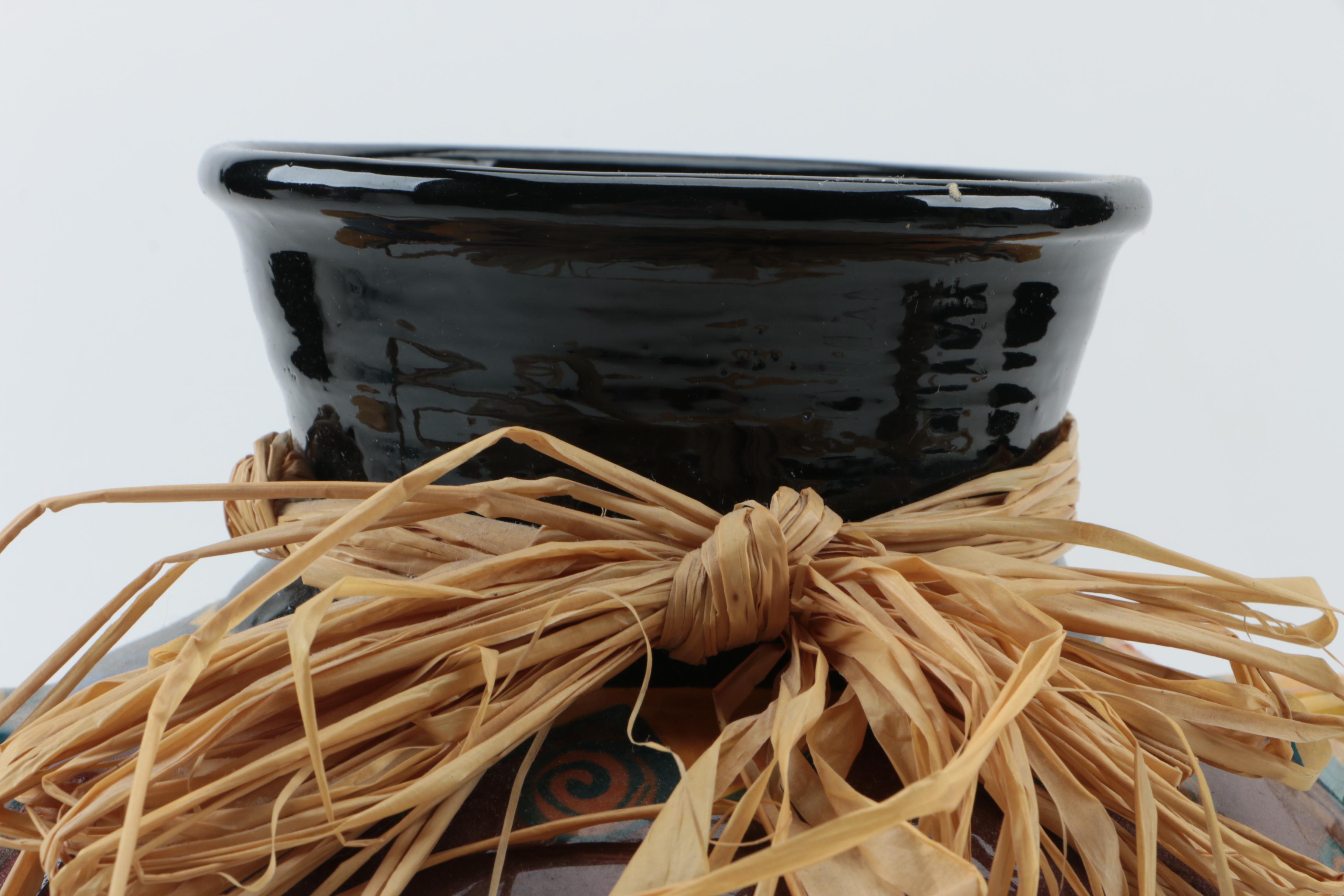 Handmade Pottery Vase and Wooden Vulture Carving