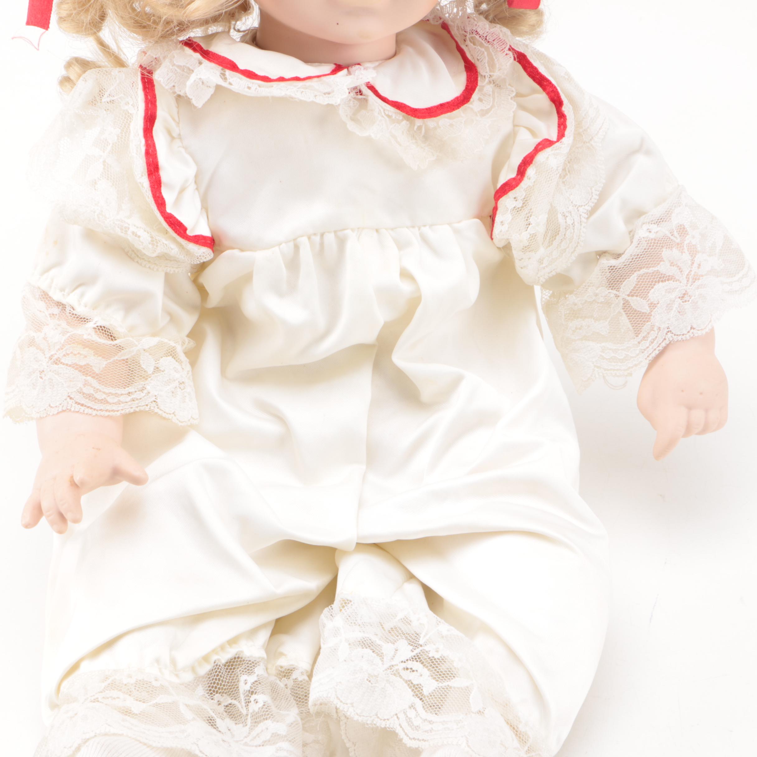 Vintage Porcelain Dolls with Blue Eyes and Blonde Curls