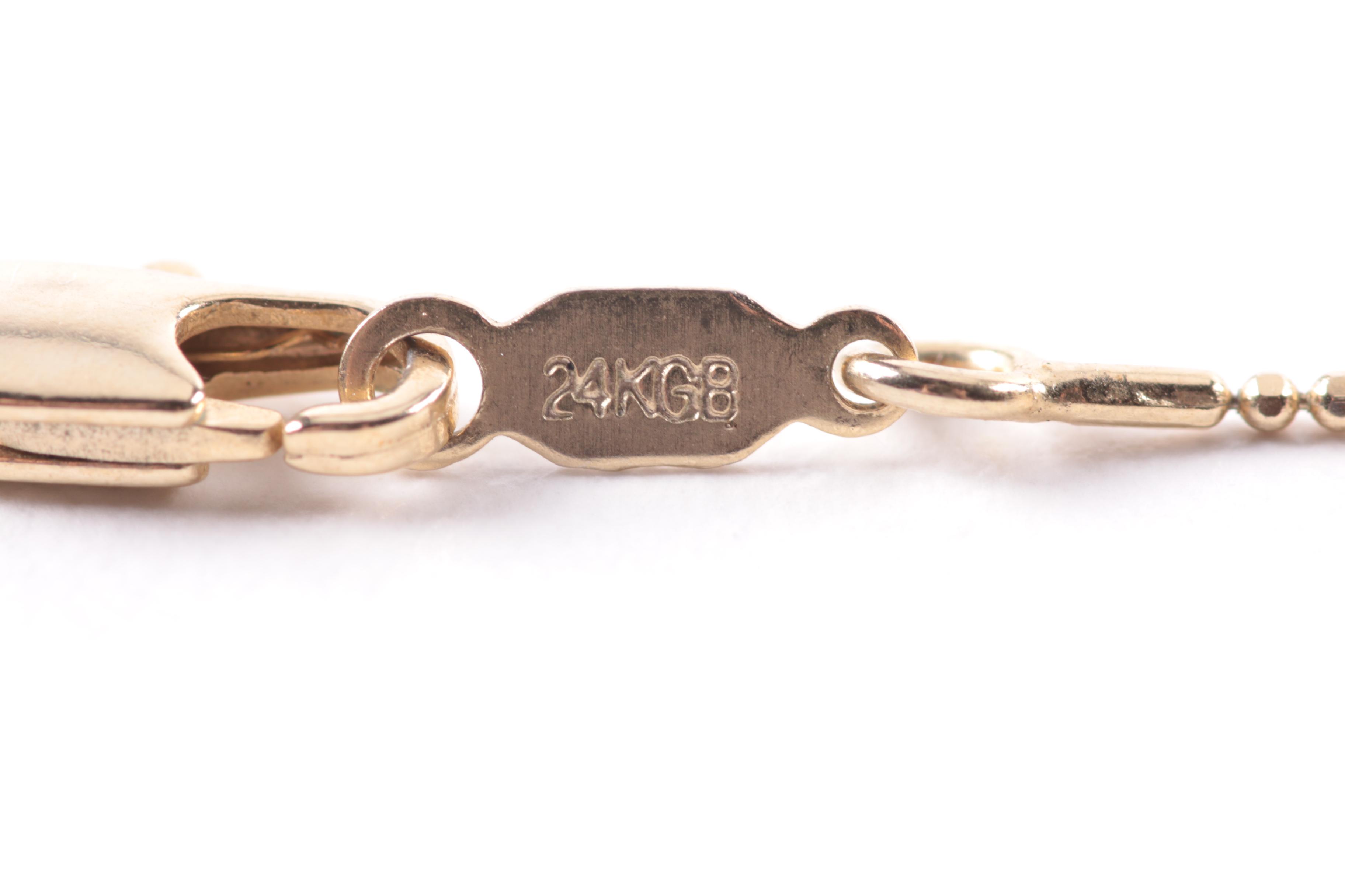 Costume Jewelry Selection Including Cloissonné Enamel and Forstner Charm