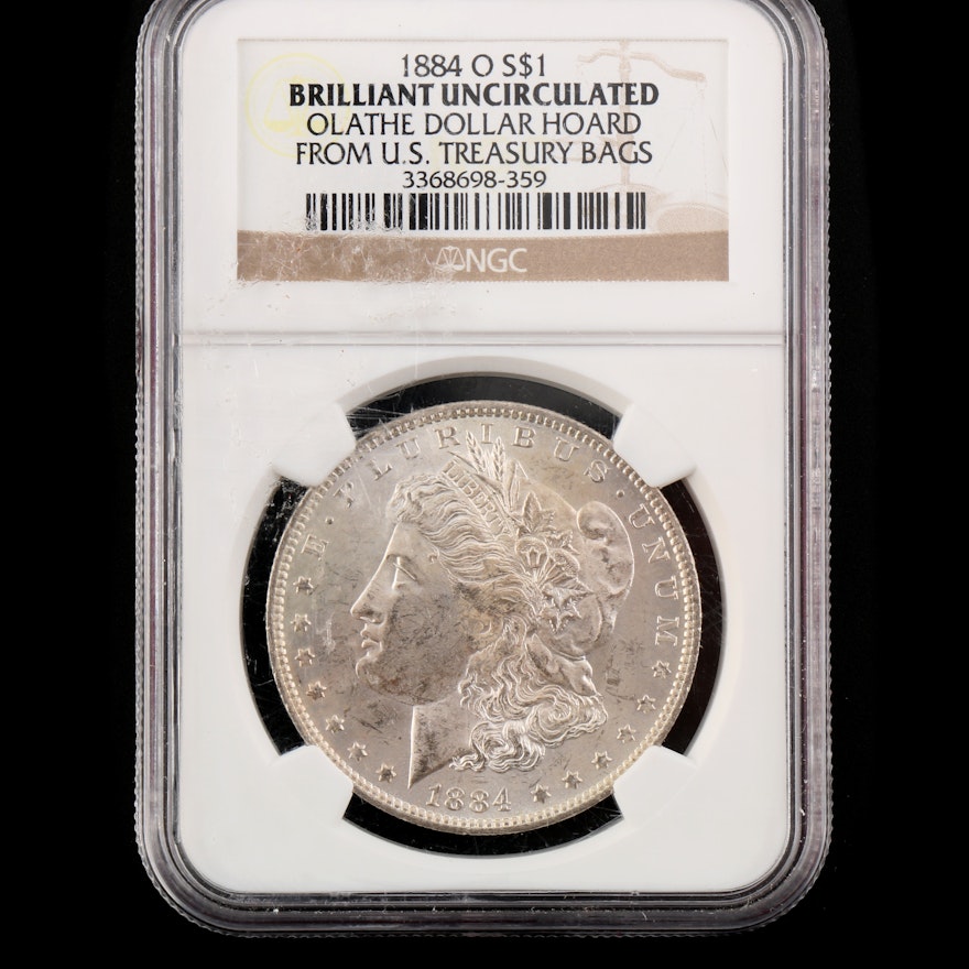 Graded Brilliant Uncirculated (by NGC) 1884-O Silver Morgan Dollar