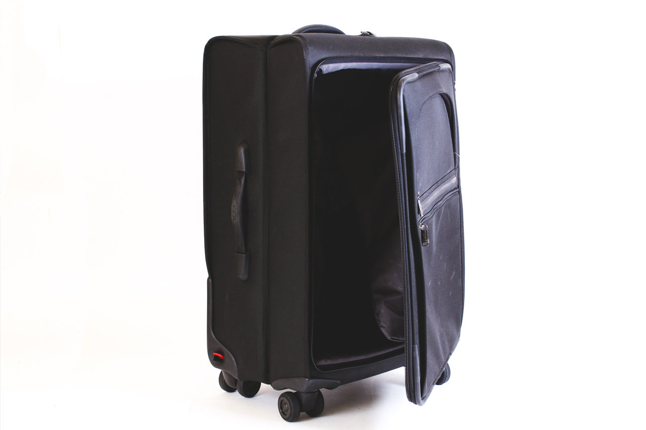 Tumi Black Nylon Roller Bag
