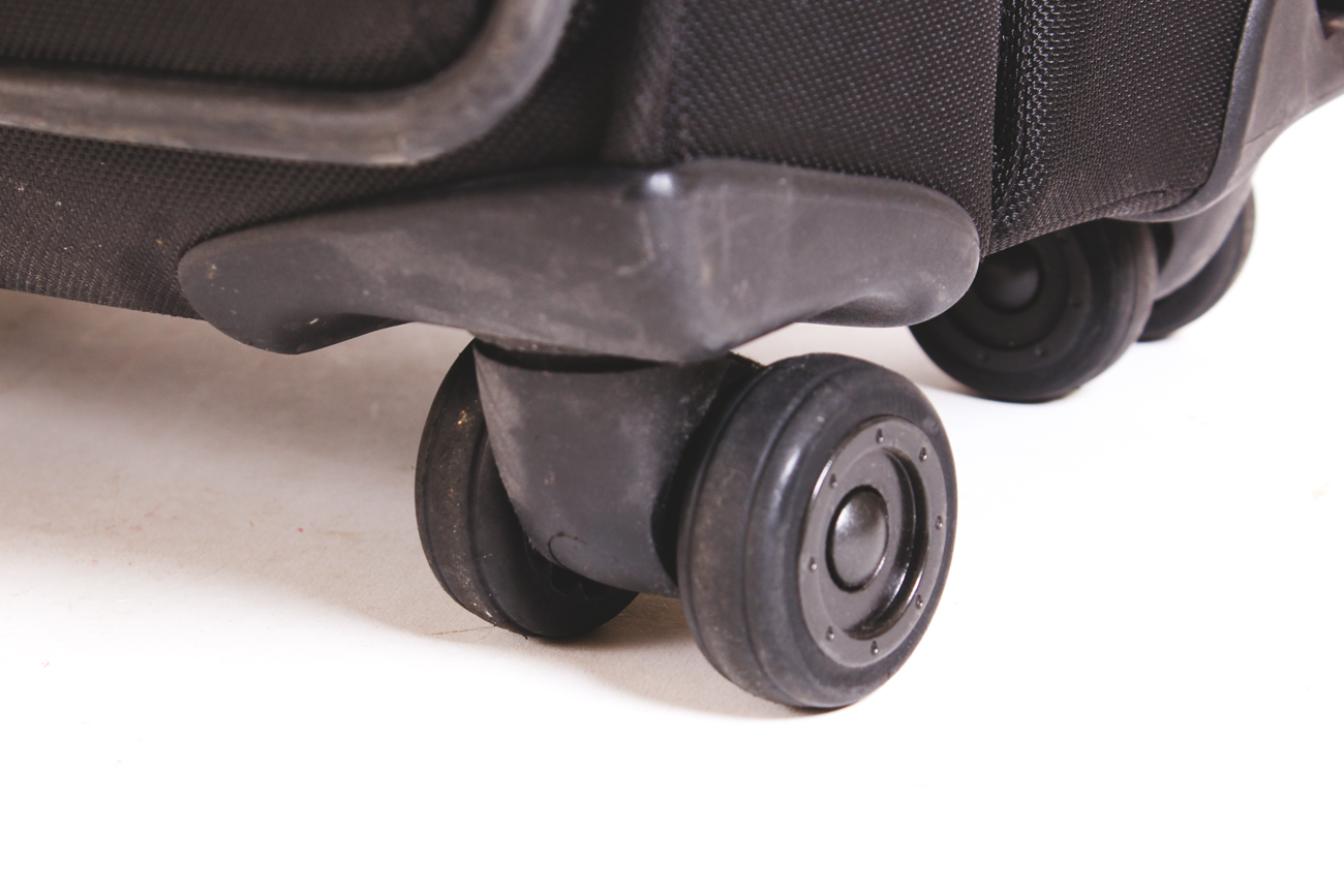 Tumi Black Nylon Roller Bag