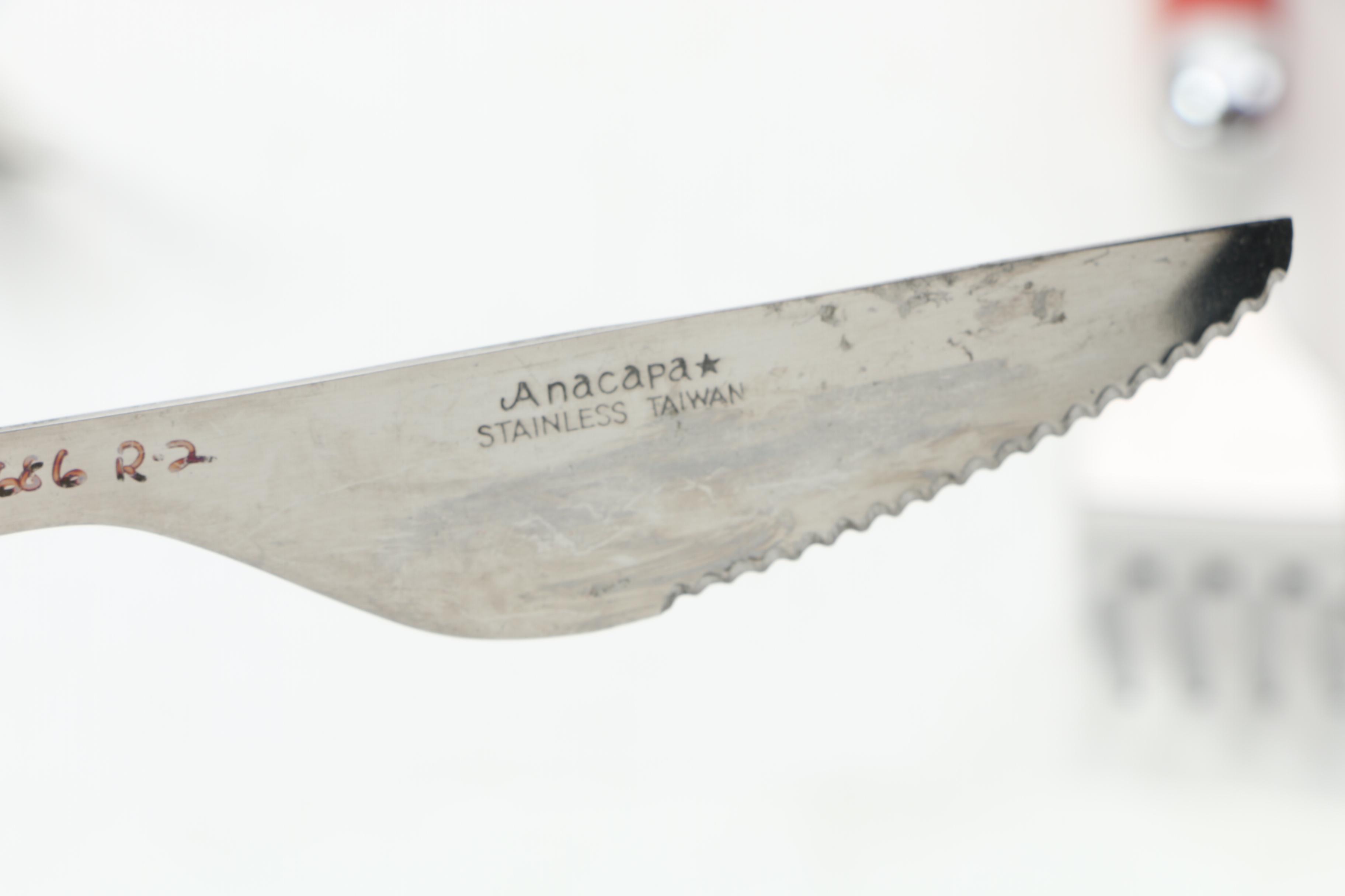 Collection of Stainless Flatware with Plastic Handles.