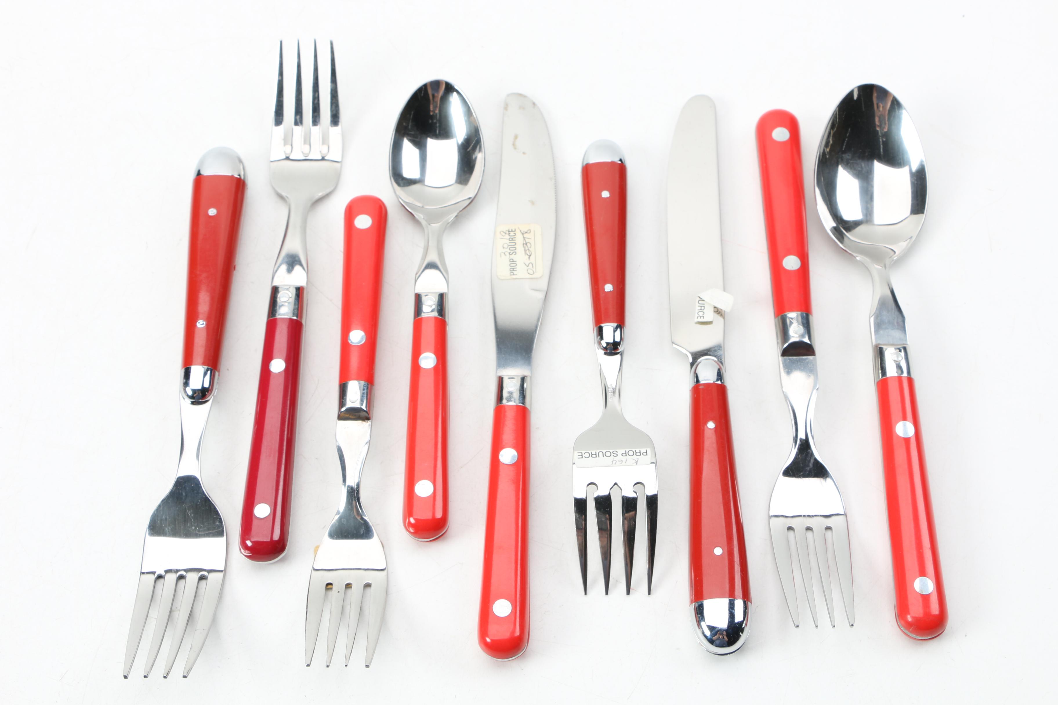 Collection of Stainless Flatware with Plastic Handles.