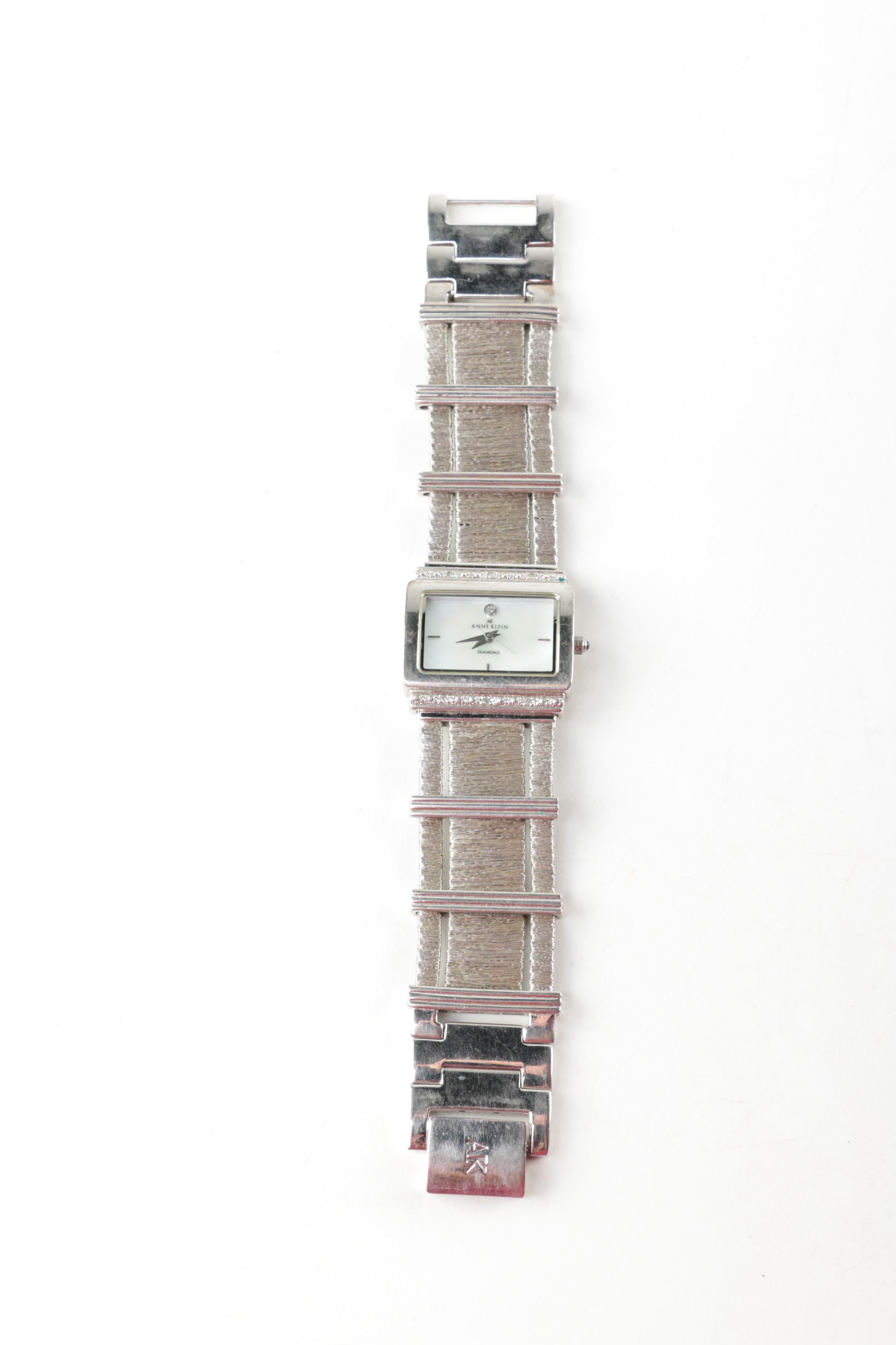 Silver Toned Watches Including Geneva, Anne Klein, and Croton