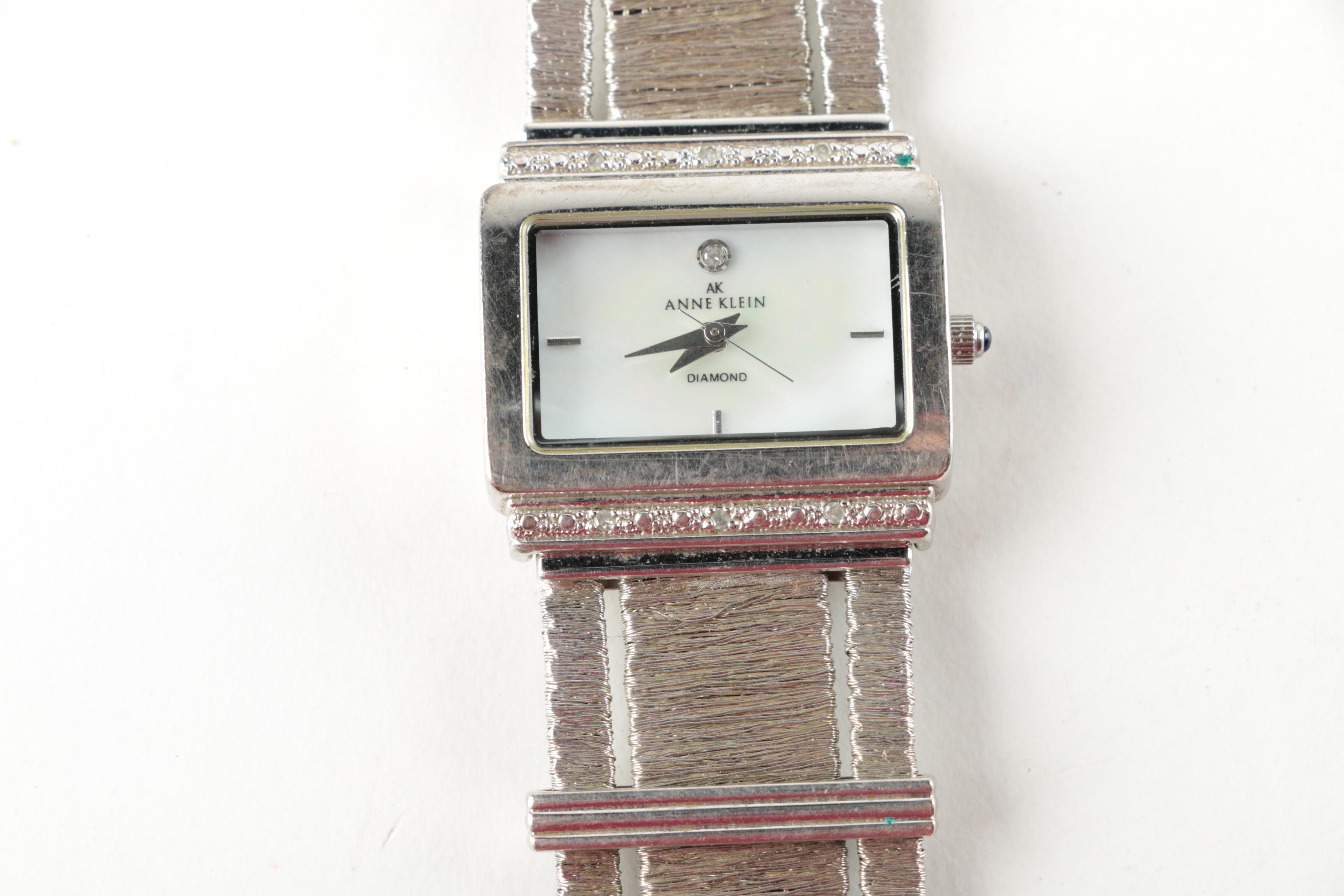 Silver Toned Watches Including Geneva, Anne Klein, and Croton