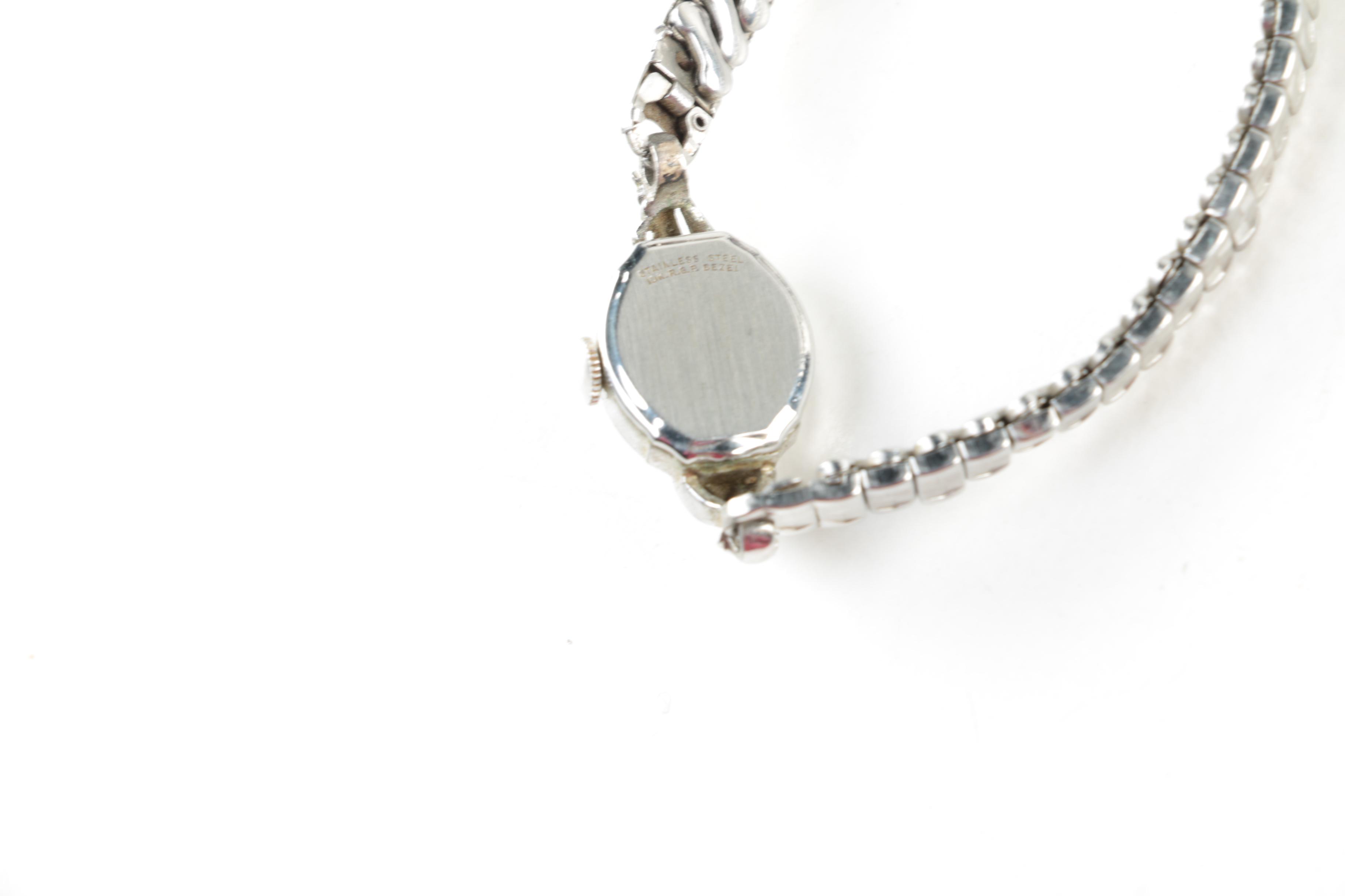 Silver Toned Watches Including Geneva, Anne Klein, and Croton