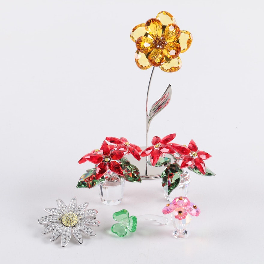 Collection of Six Swarovski and Iris Arc Crystal Floral Figurines