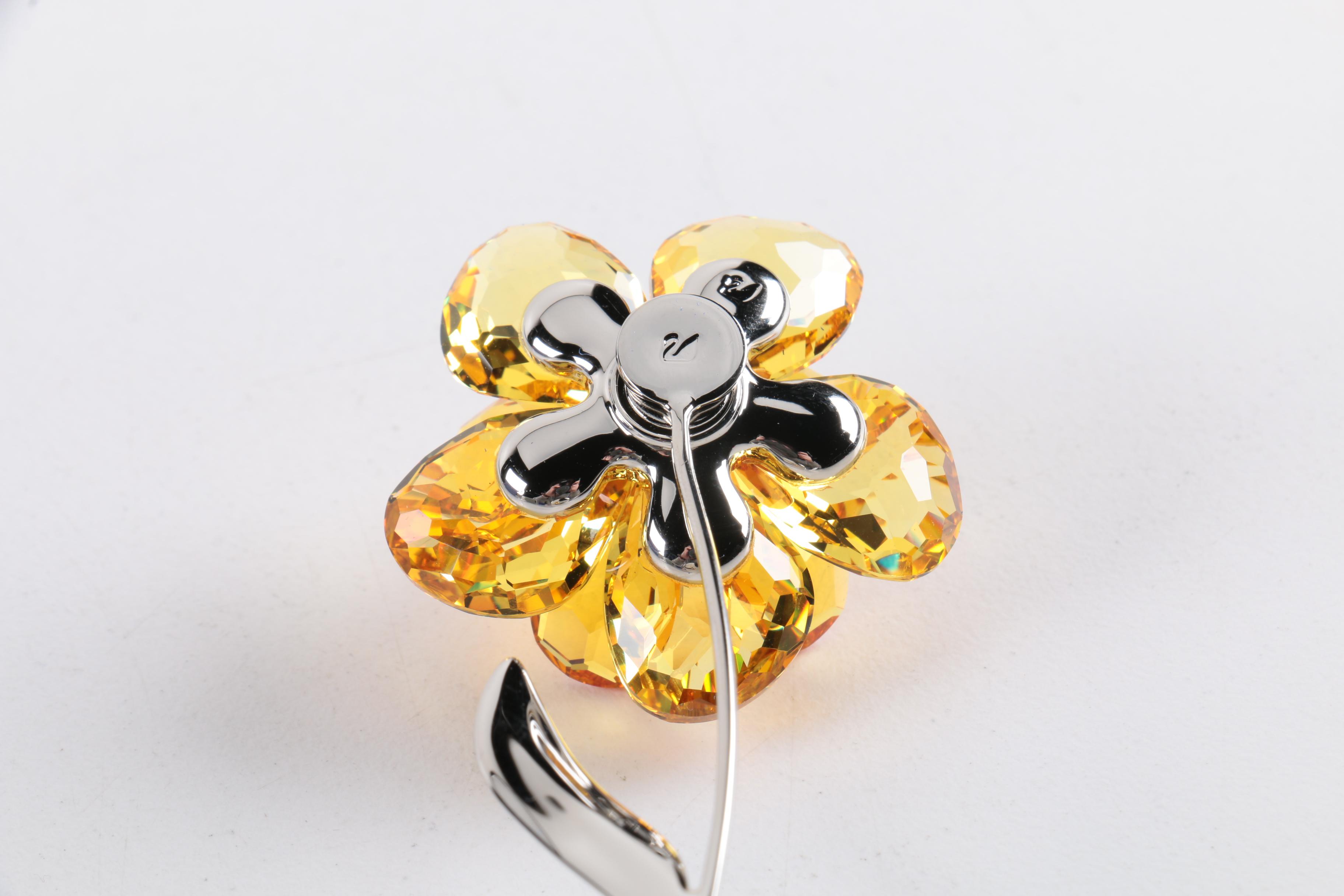 Collection of Six Swarovski and Iris Arc Crystal Floral Figurines