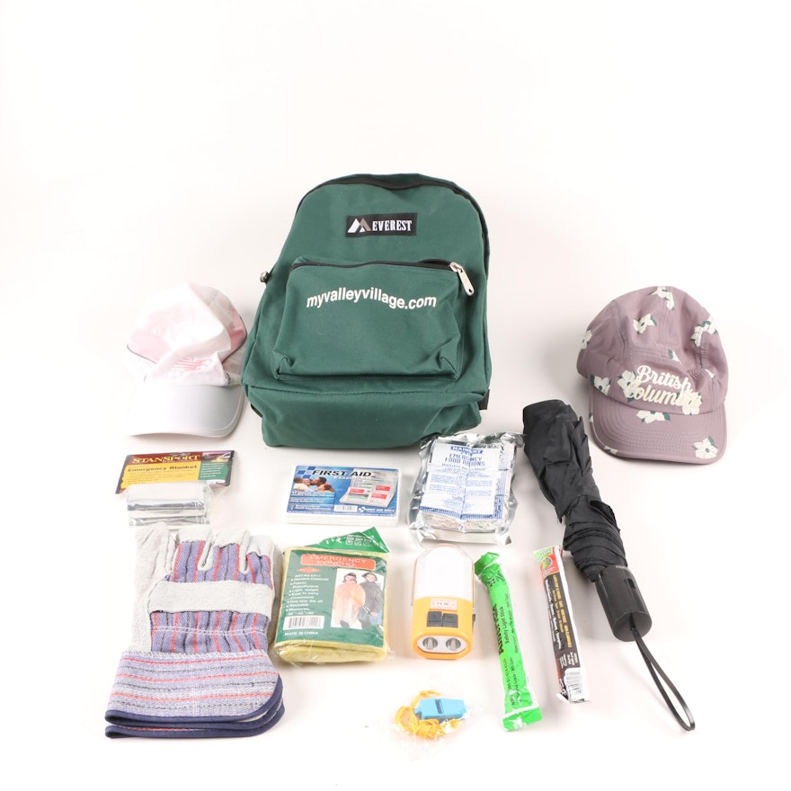 Emergency Supplies In Green Backpack