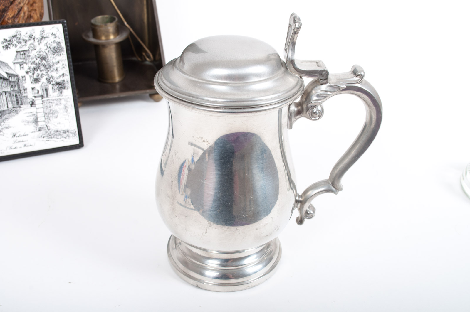 Assortment of Home Decor Featuring Oneida Heirloom Pewter Stein