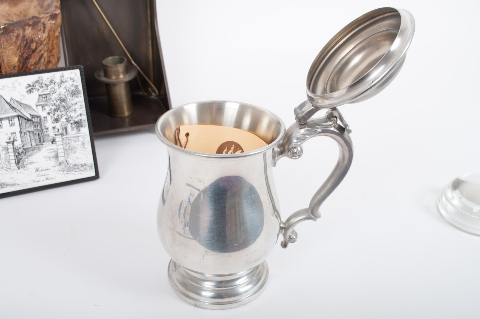 Assortment of Home Decor Featuring Oneida Heirloom Pewter Stein