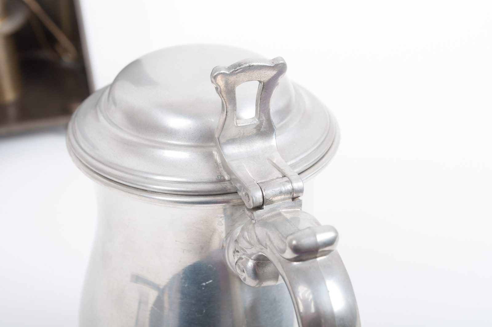 Assortment of Home Decor Featuring Oneida Heirloom Pewter Stein