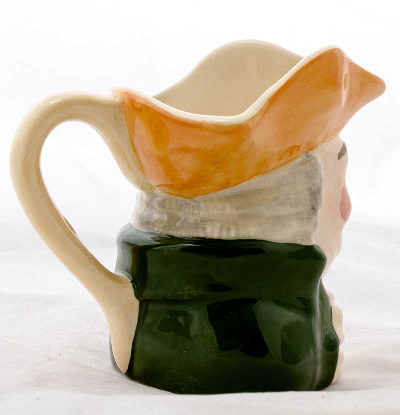 Staffordshire Toby Pitcher and Ceramic Character Jugs