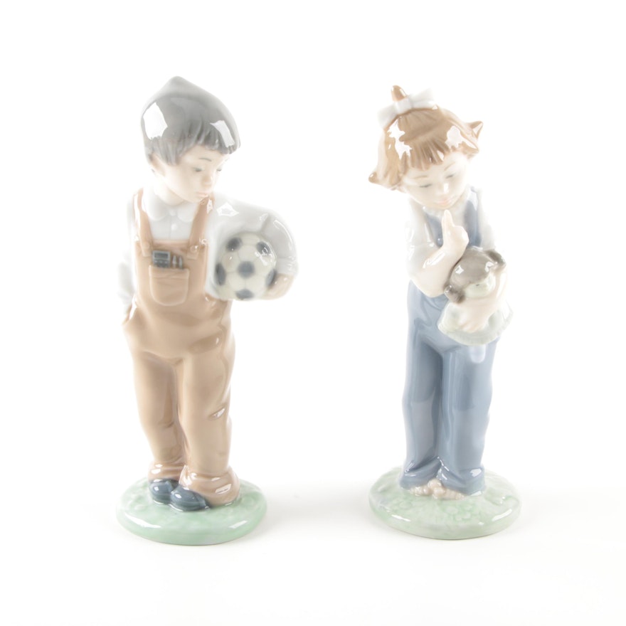 Lladró "Boy with Ball" and "Girl with Doll" Porcelain Figurines