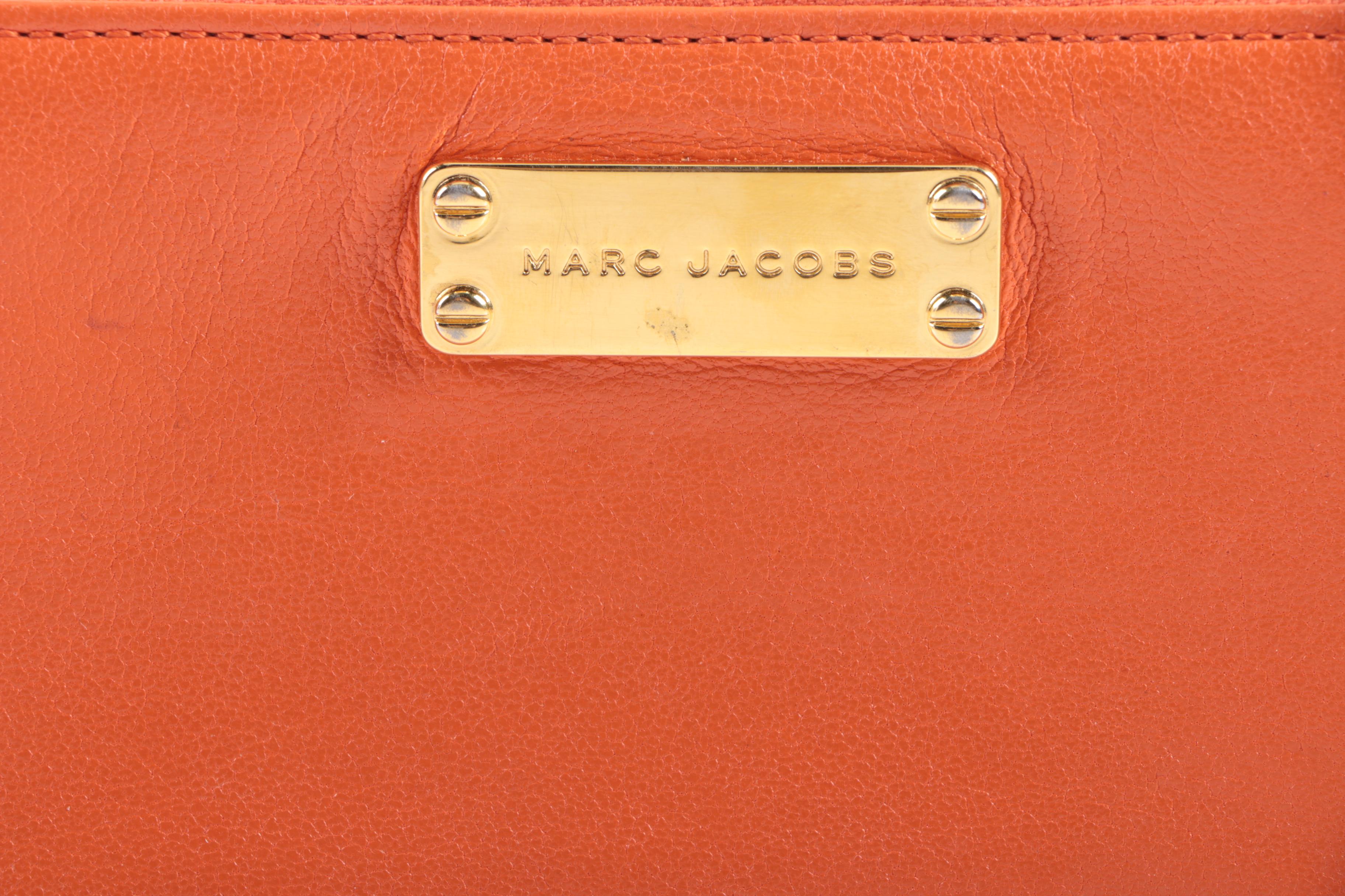 Marc Jacobs and Lodis Orange Wallets