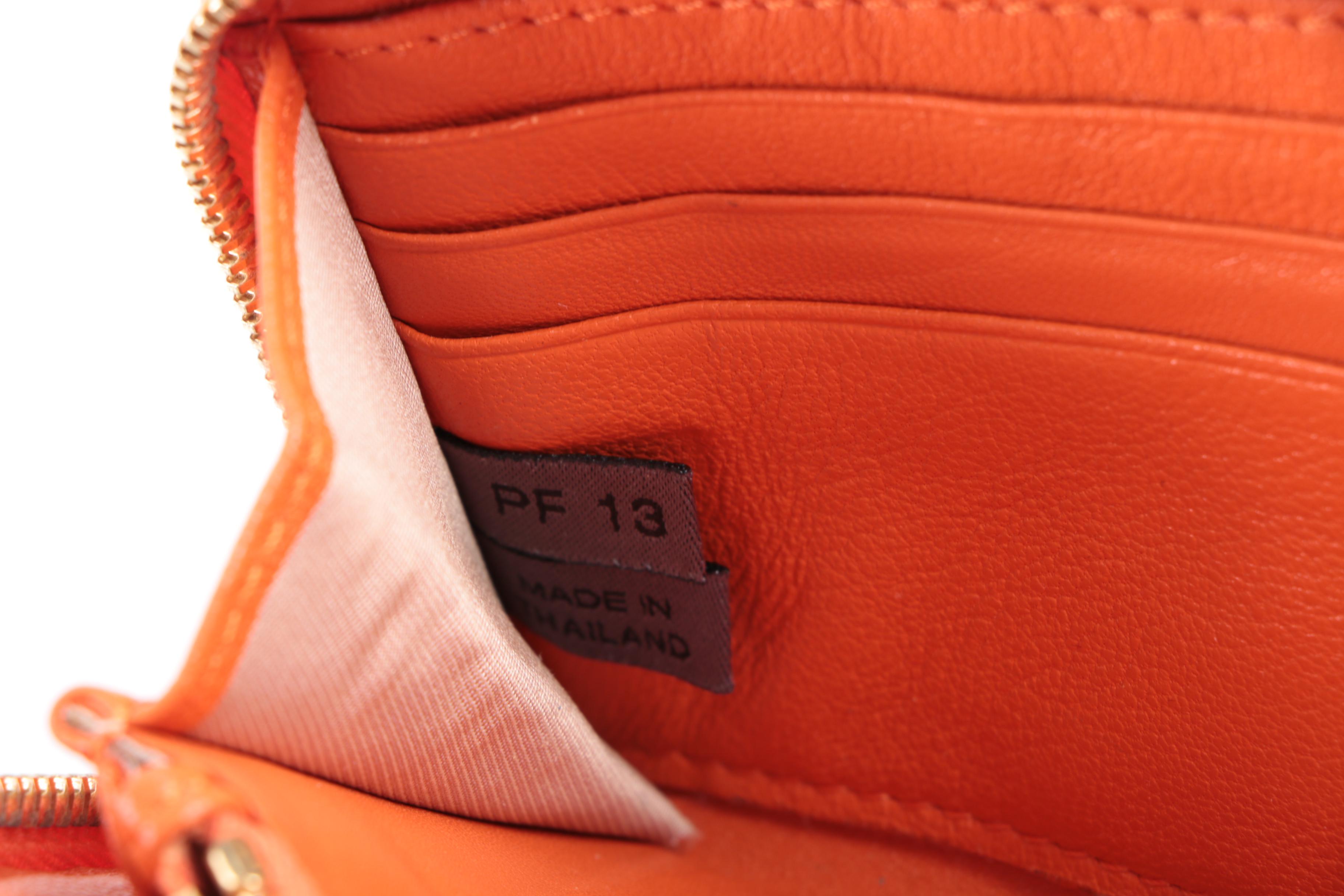 Marc Jacobs and Lodis Orange Wallets