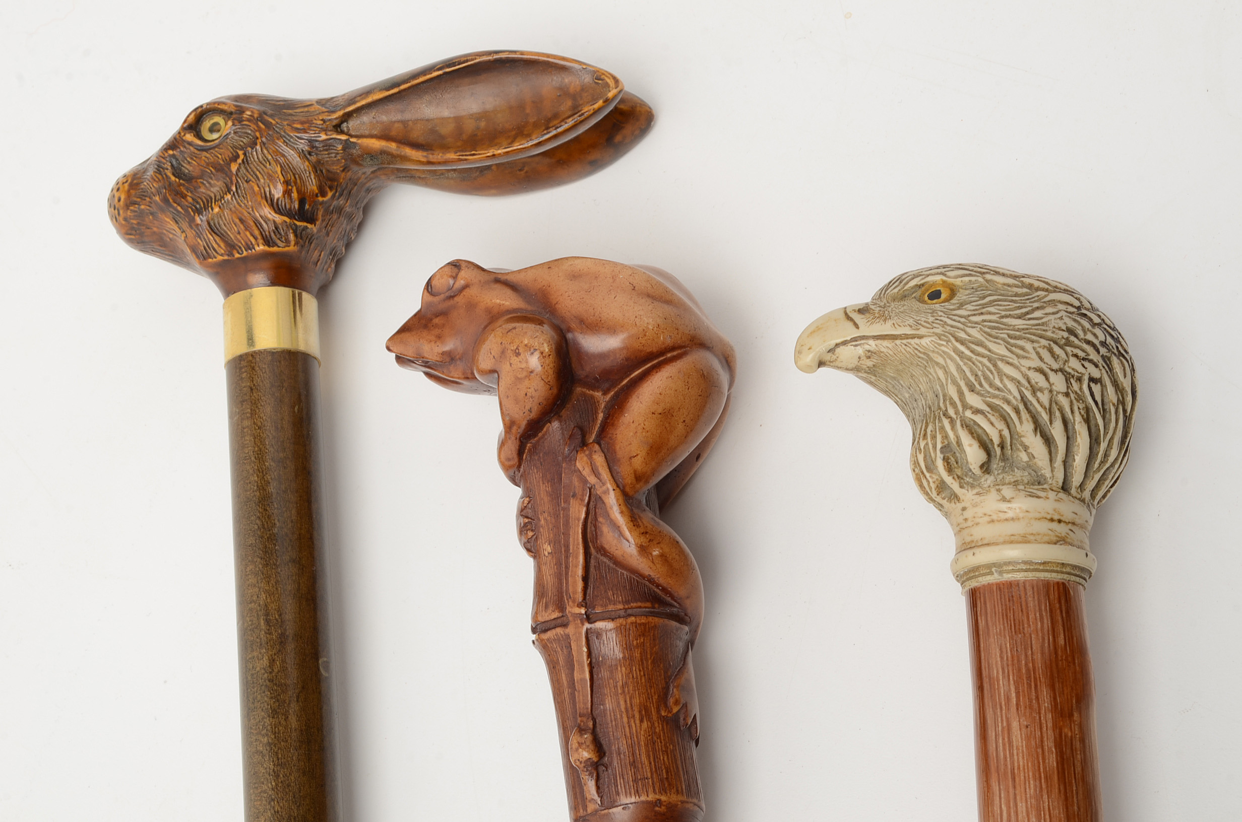 Three Carved Walking Sticks