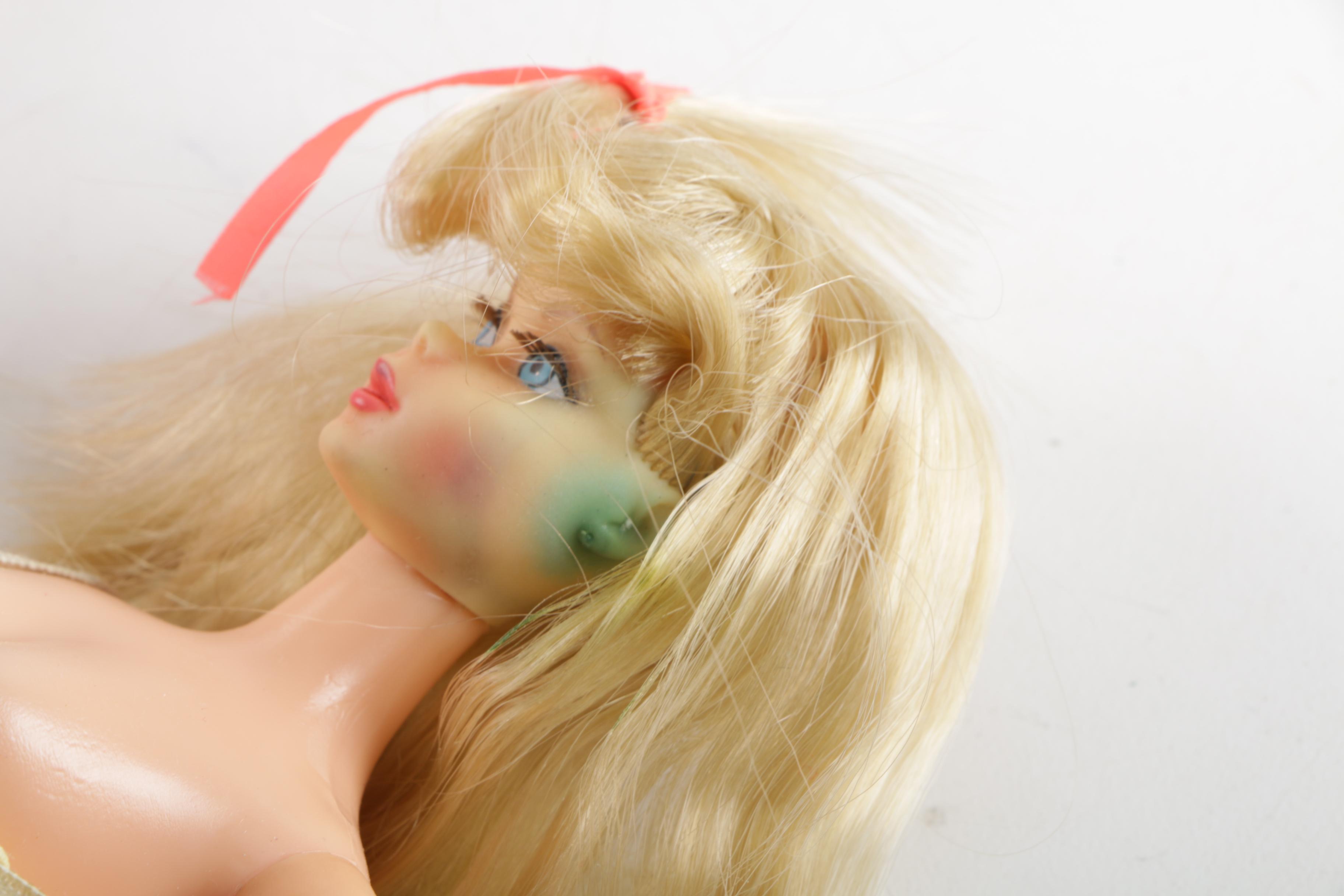 1960s Mattel "Ken" and "Twist n' Turn Waist" Barbie Dolls and Accessories