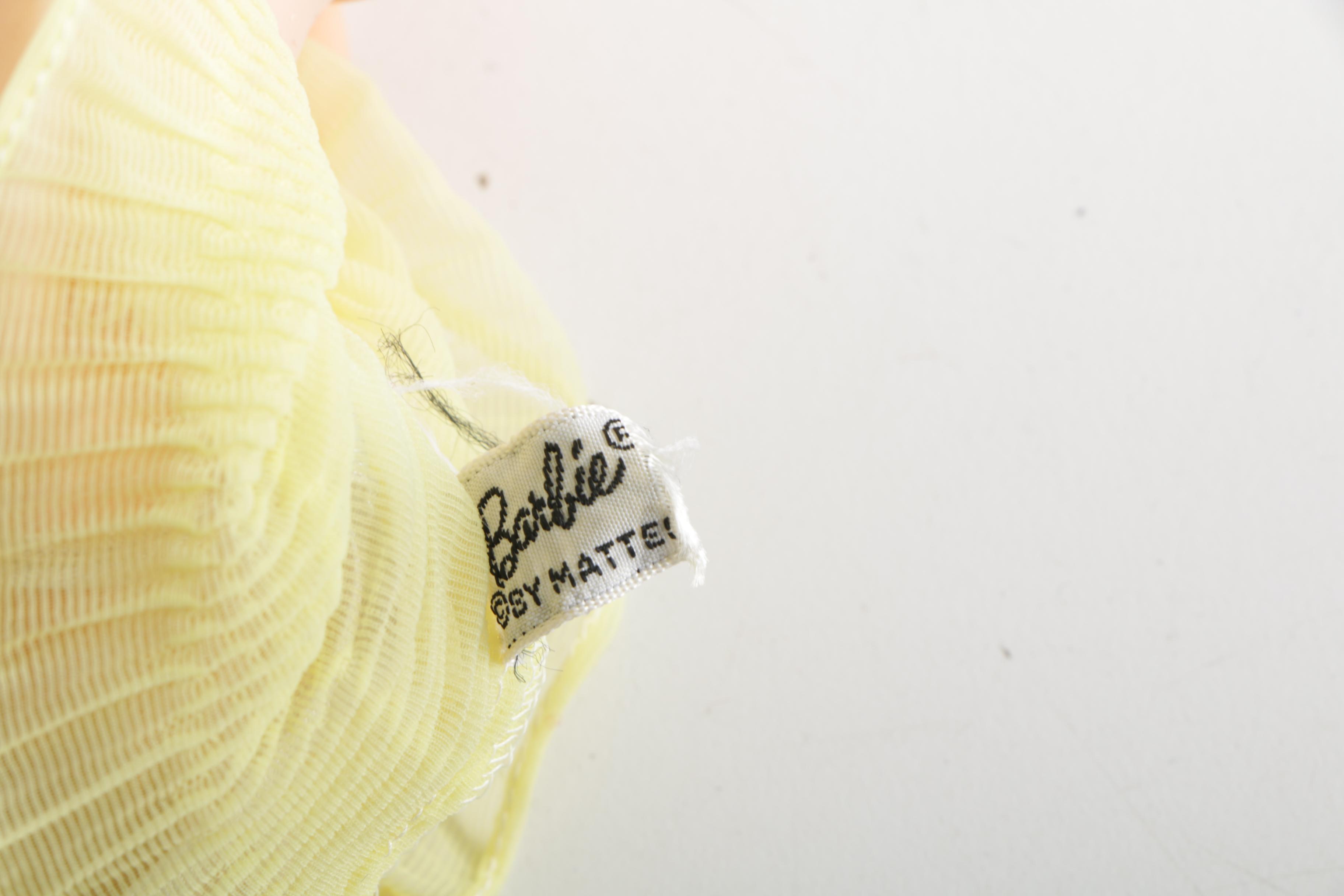 1960s Mattel "Ken" and "Twist n' Turn Waist" Barbie Dolls and Accessories