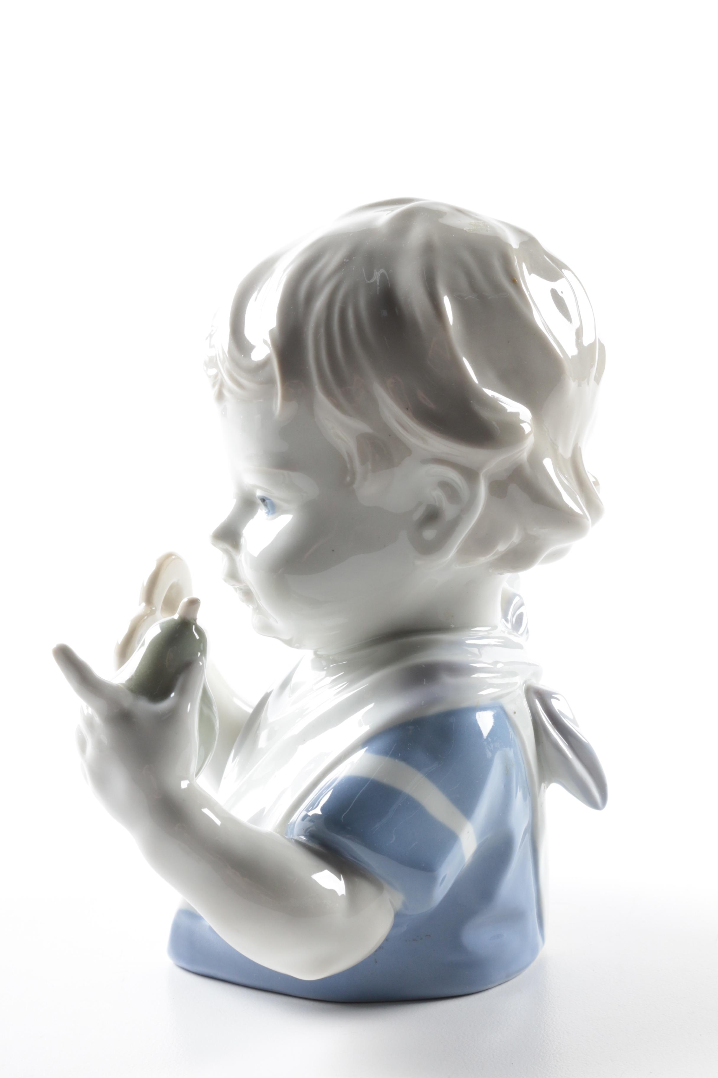 Lippelsdorf Boy with Snack Porcelain Figurine