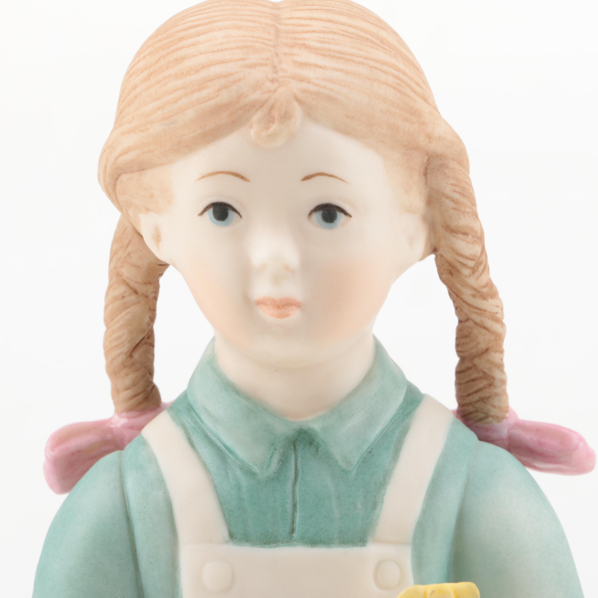 Vintage Laszlo Ispanky Porcelain Girl with Flower Figurine