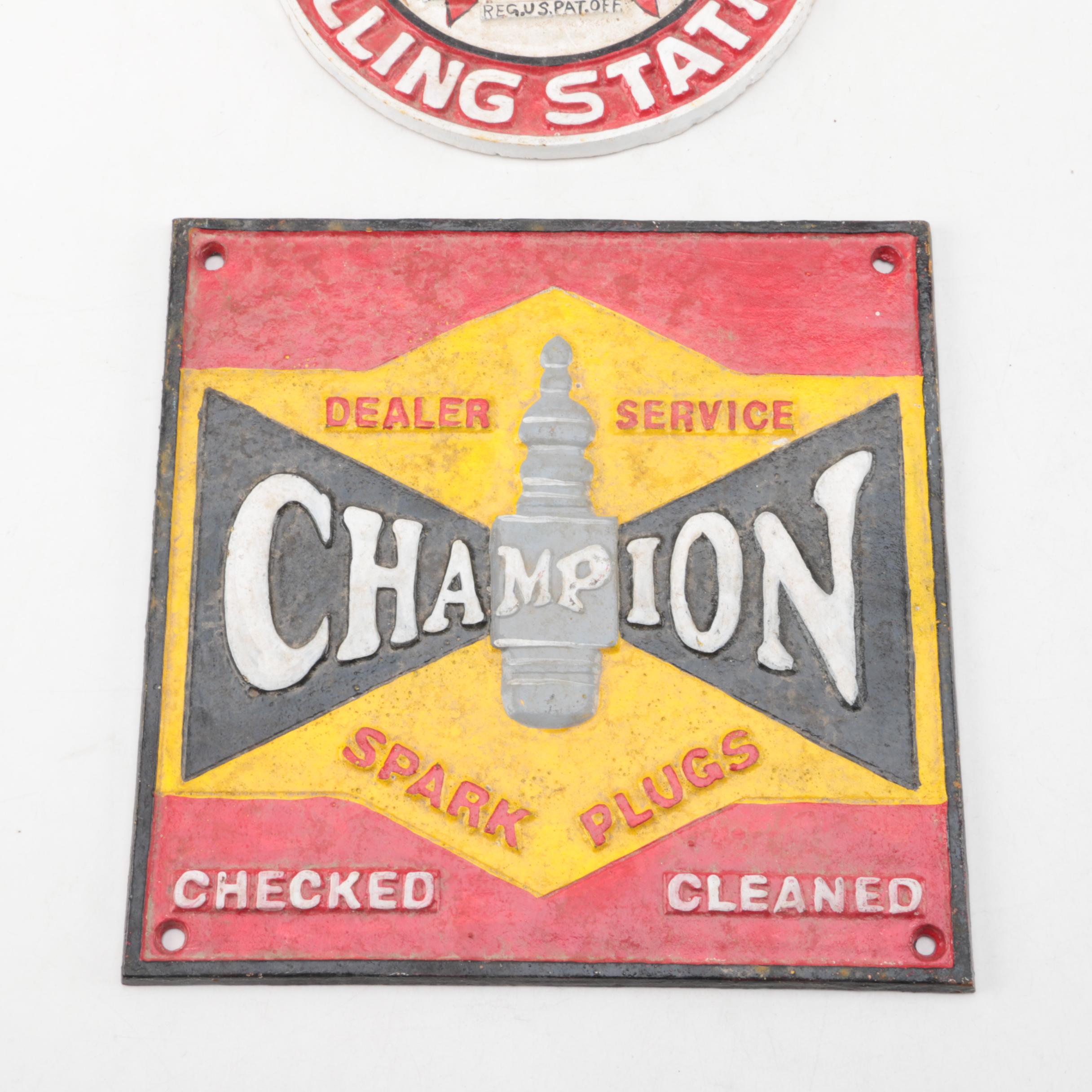 Champion Spark Plugs and Texaco Motor Oil Cast Iron Signs