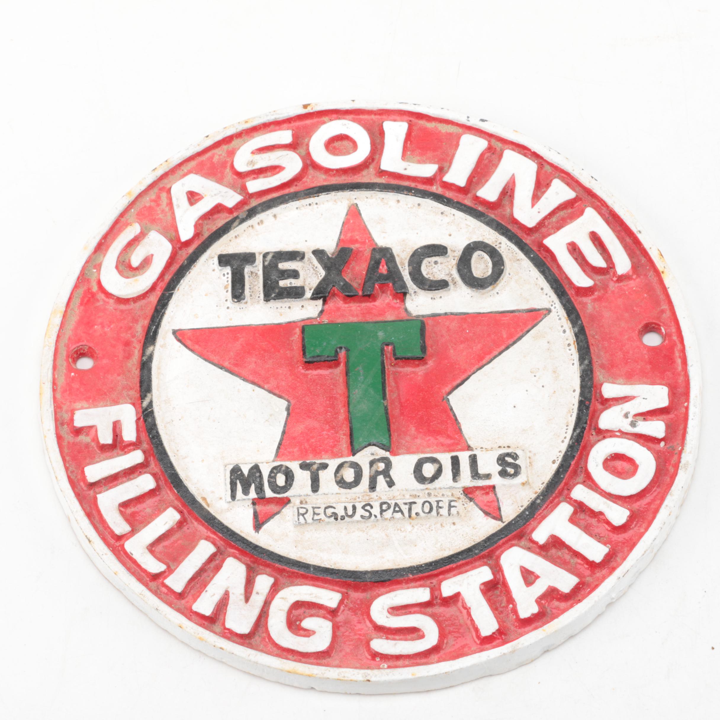 Champion Spark Plugs and Texaco Motor Oil Cast Iron Signs