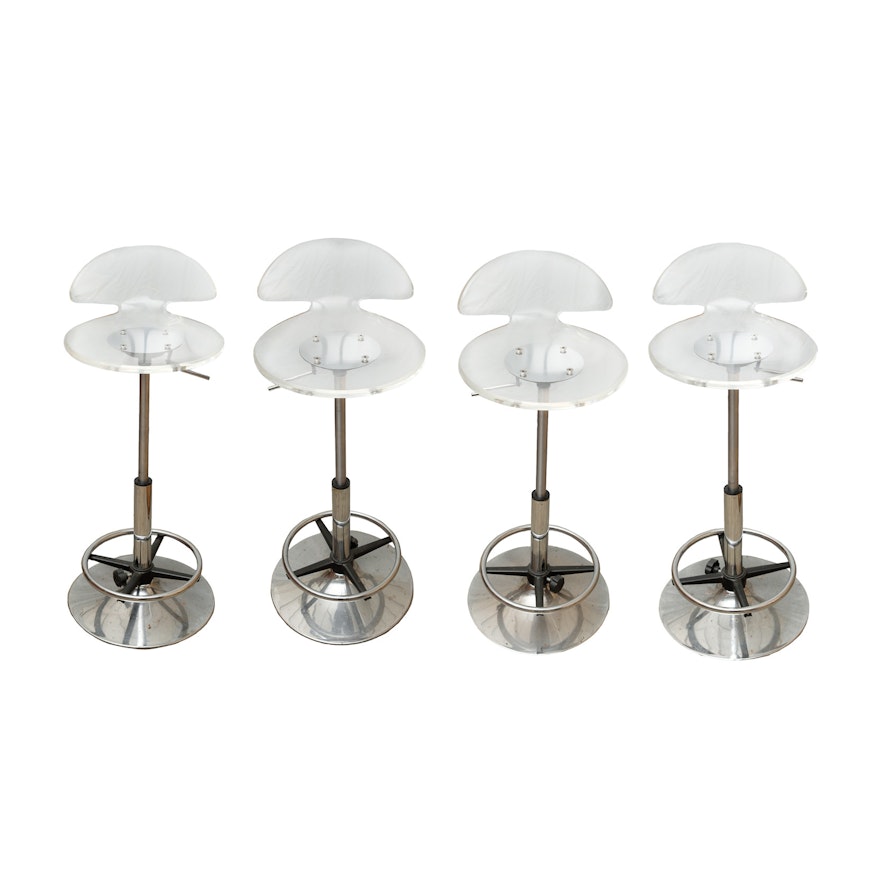 Four Modern Adjustable Acrylic and Chrome Barstools