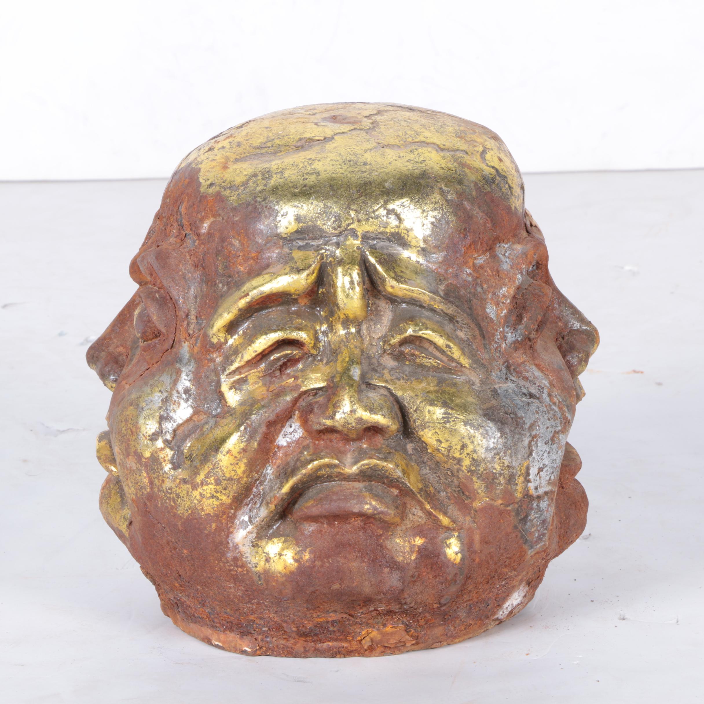 Sculpture of Head with Four Faces