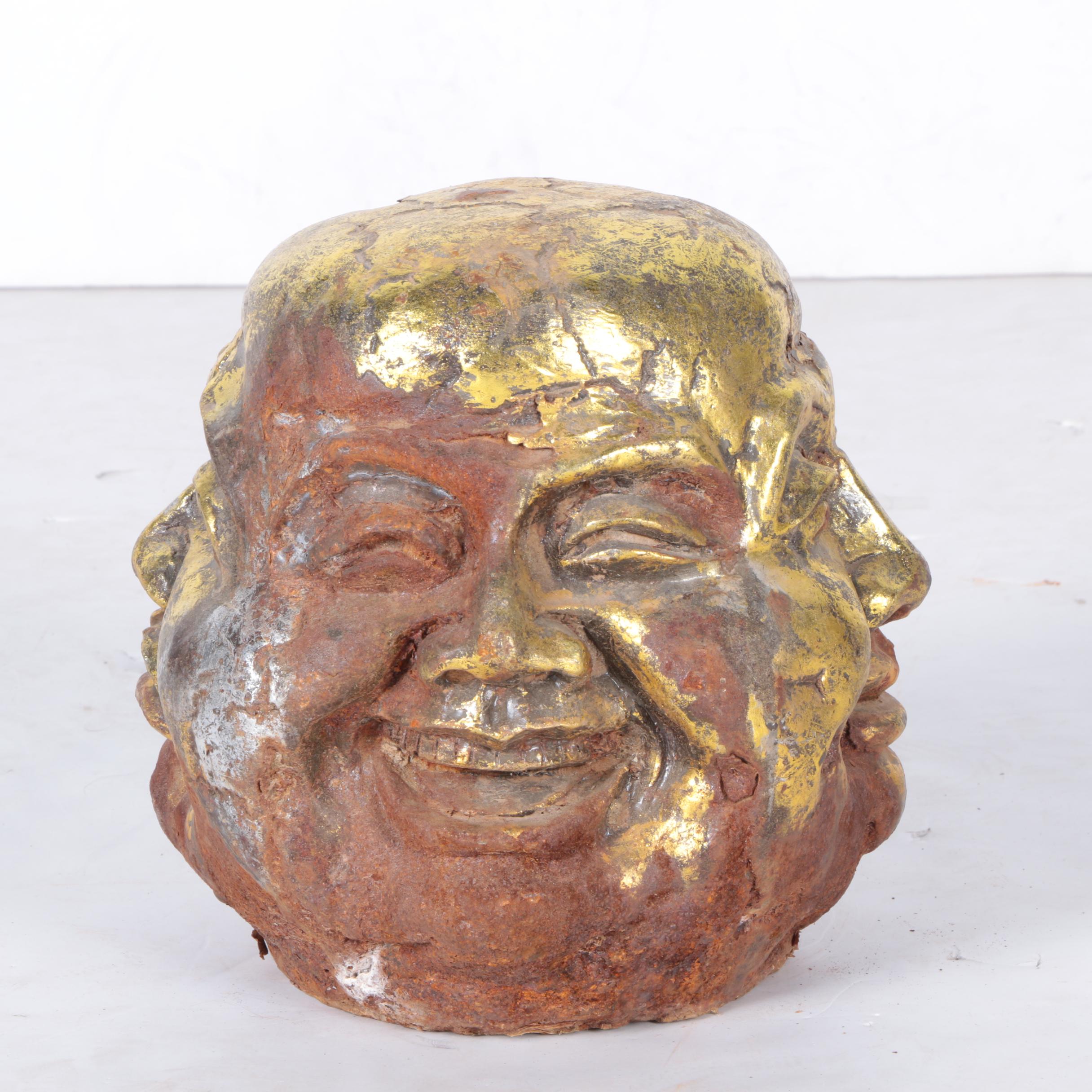 Sculpture of Head with Four Faces