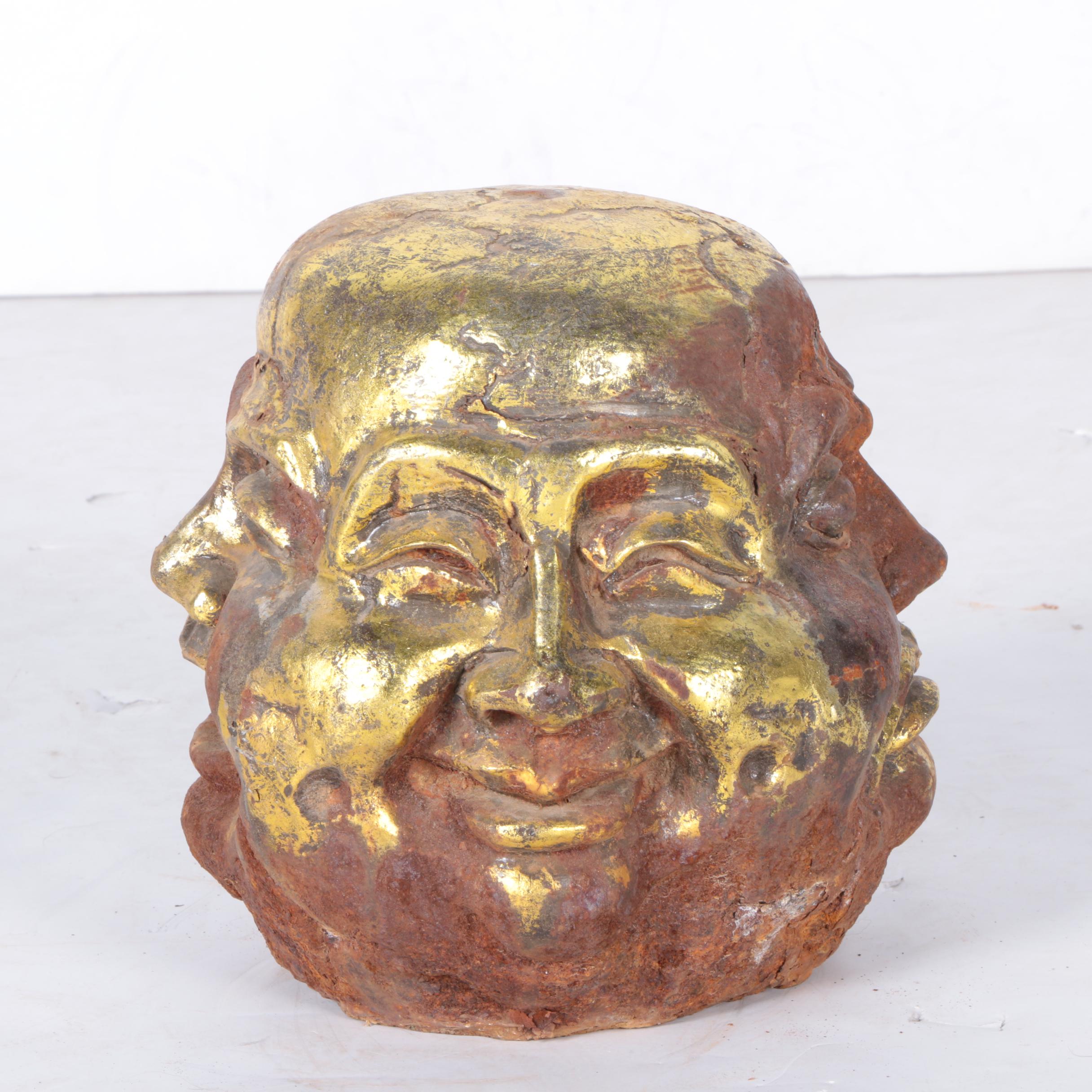 Sculpture of Head with Four Faces