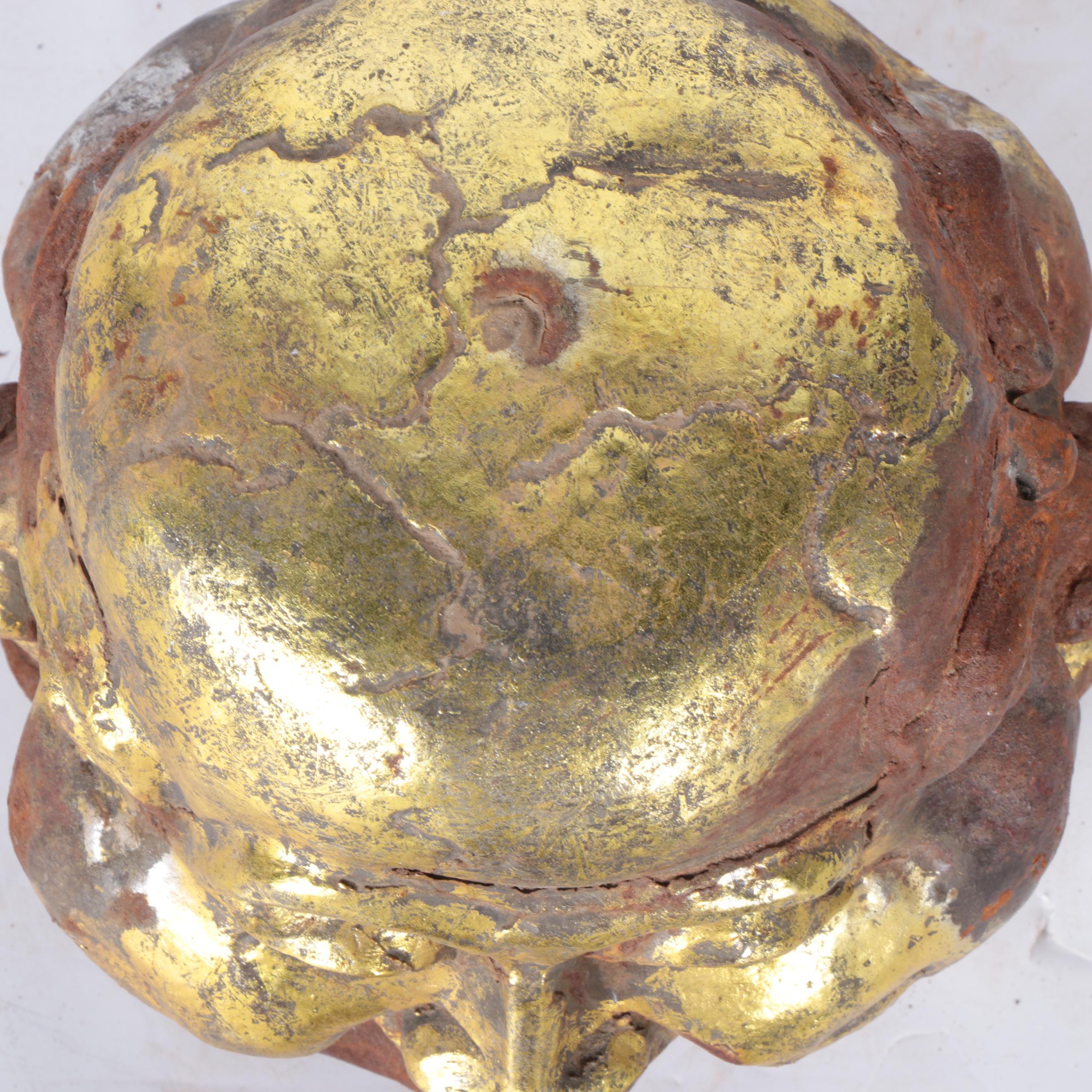 Sculpture of Head with Four Faces