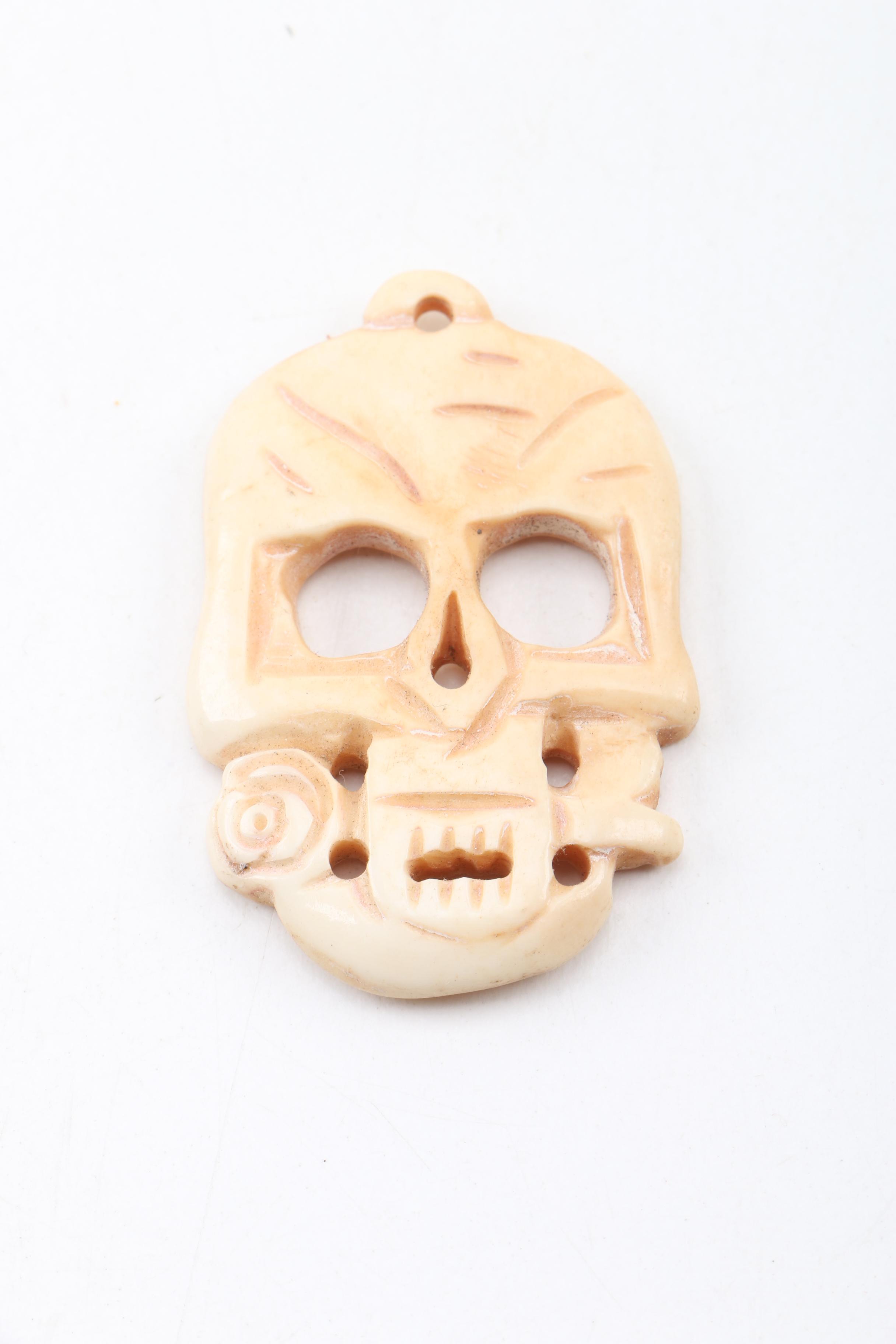 Carved Bone Skull Figurines