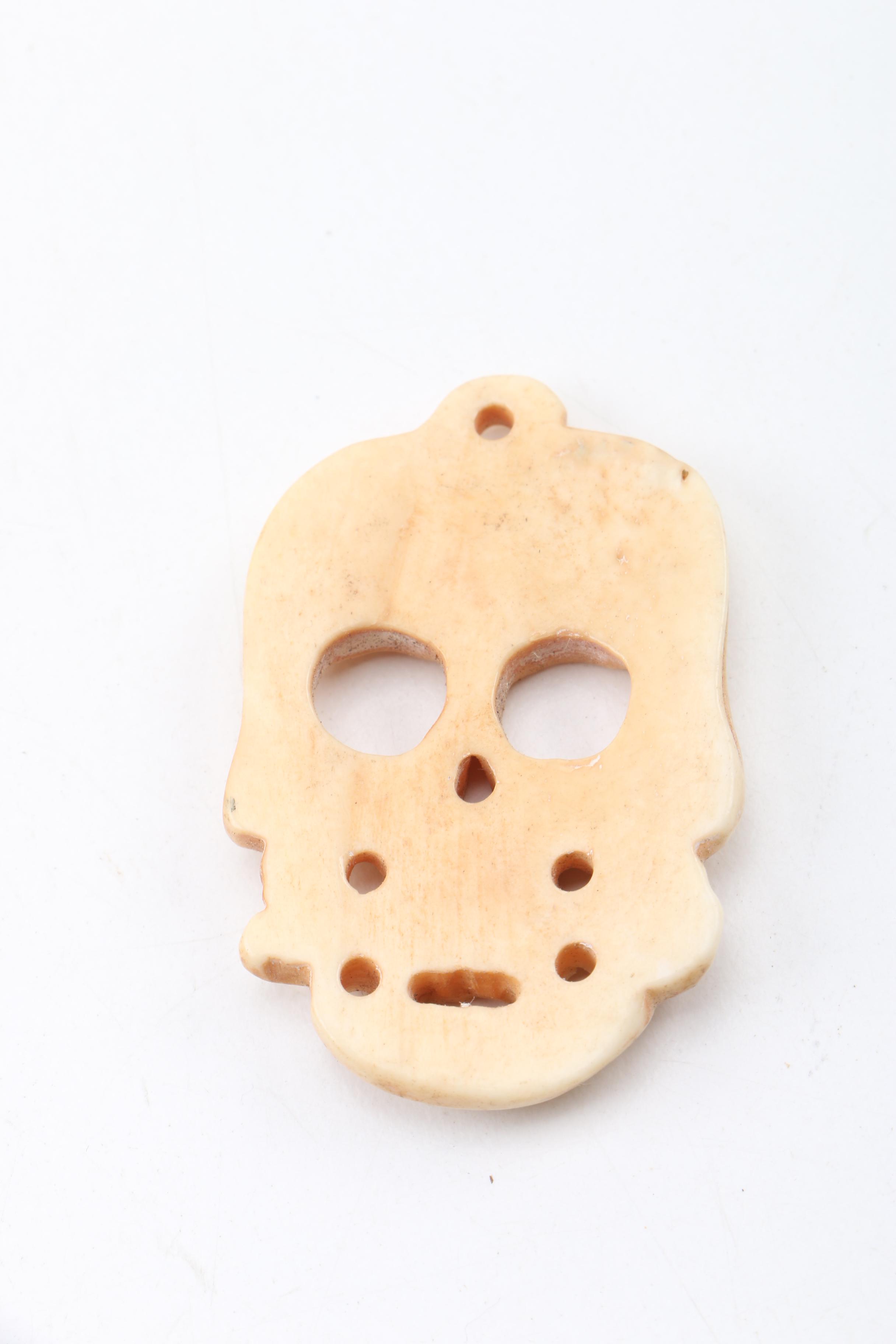 Carved Bone Skull Figurines
