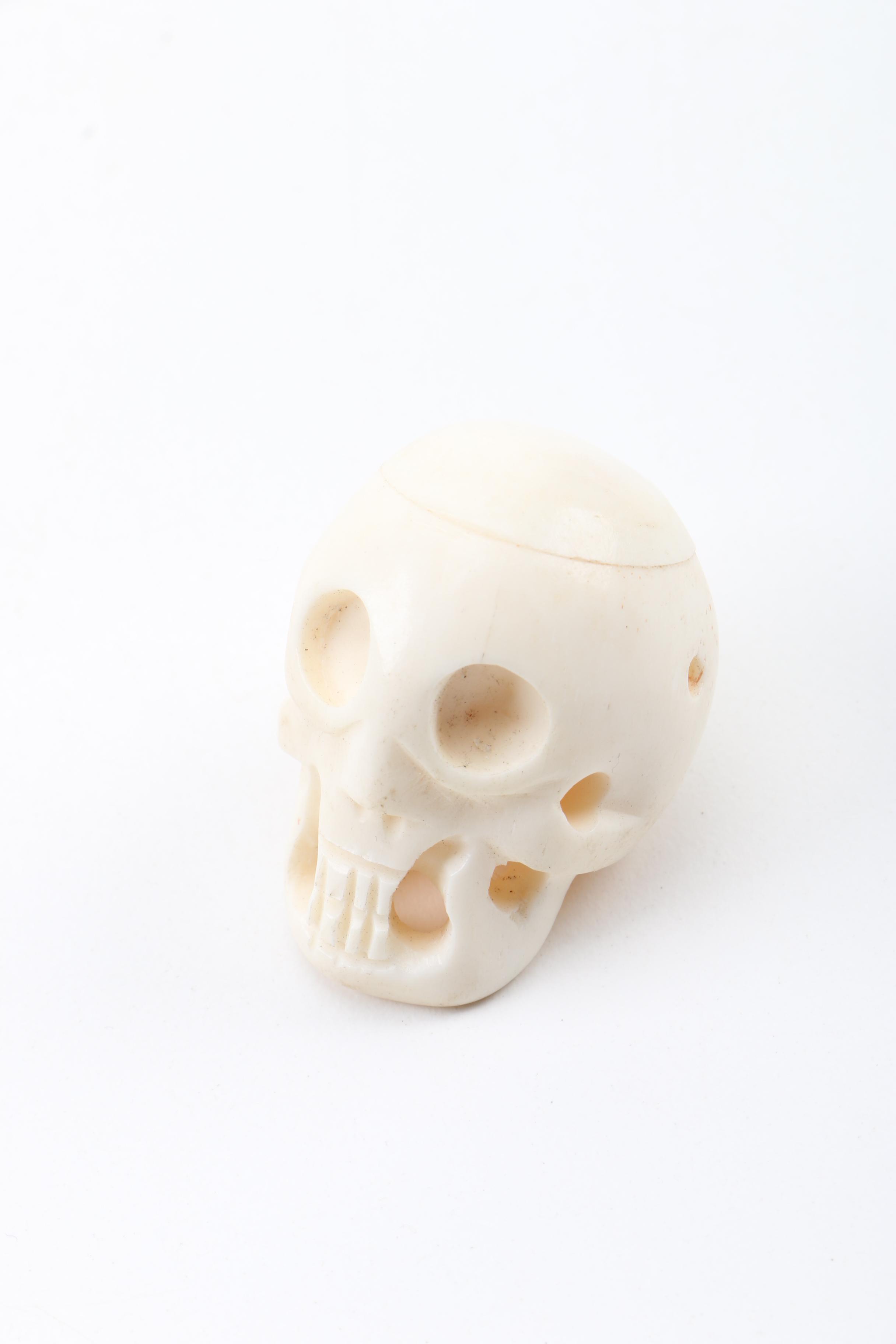 Carved Bone Skull Figurines