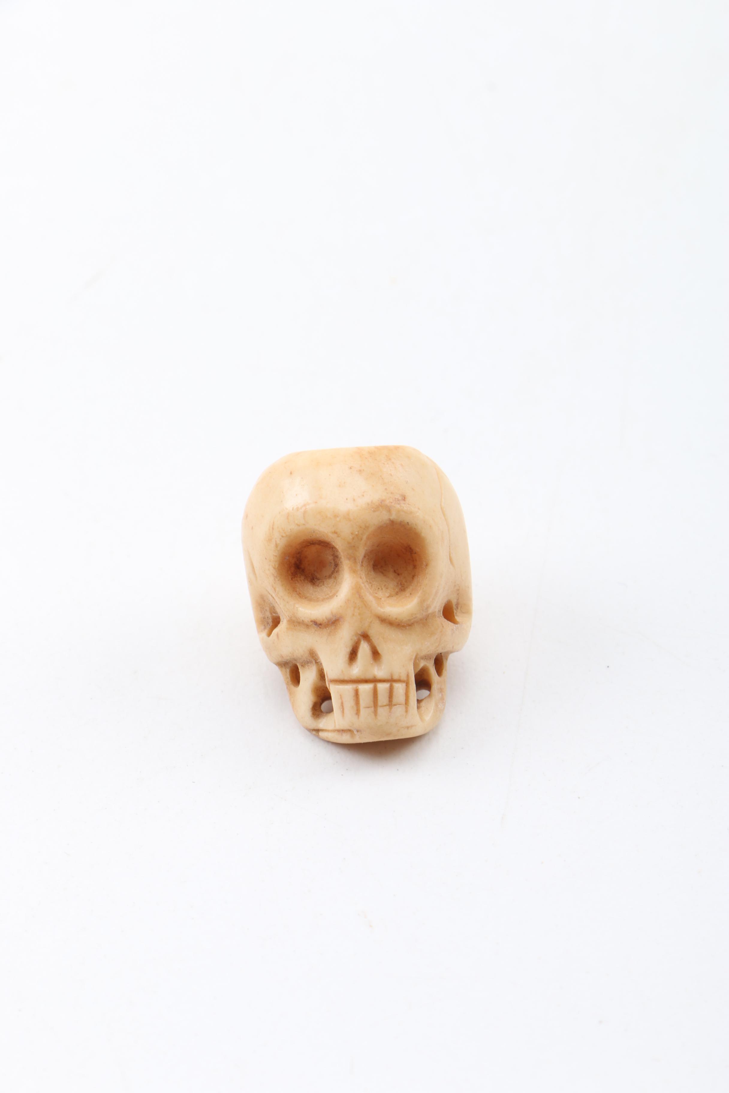 Carved Bone Skull Figurines