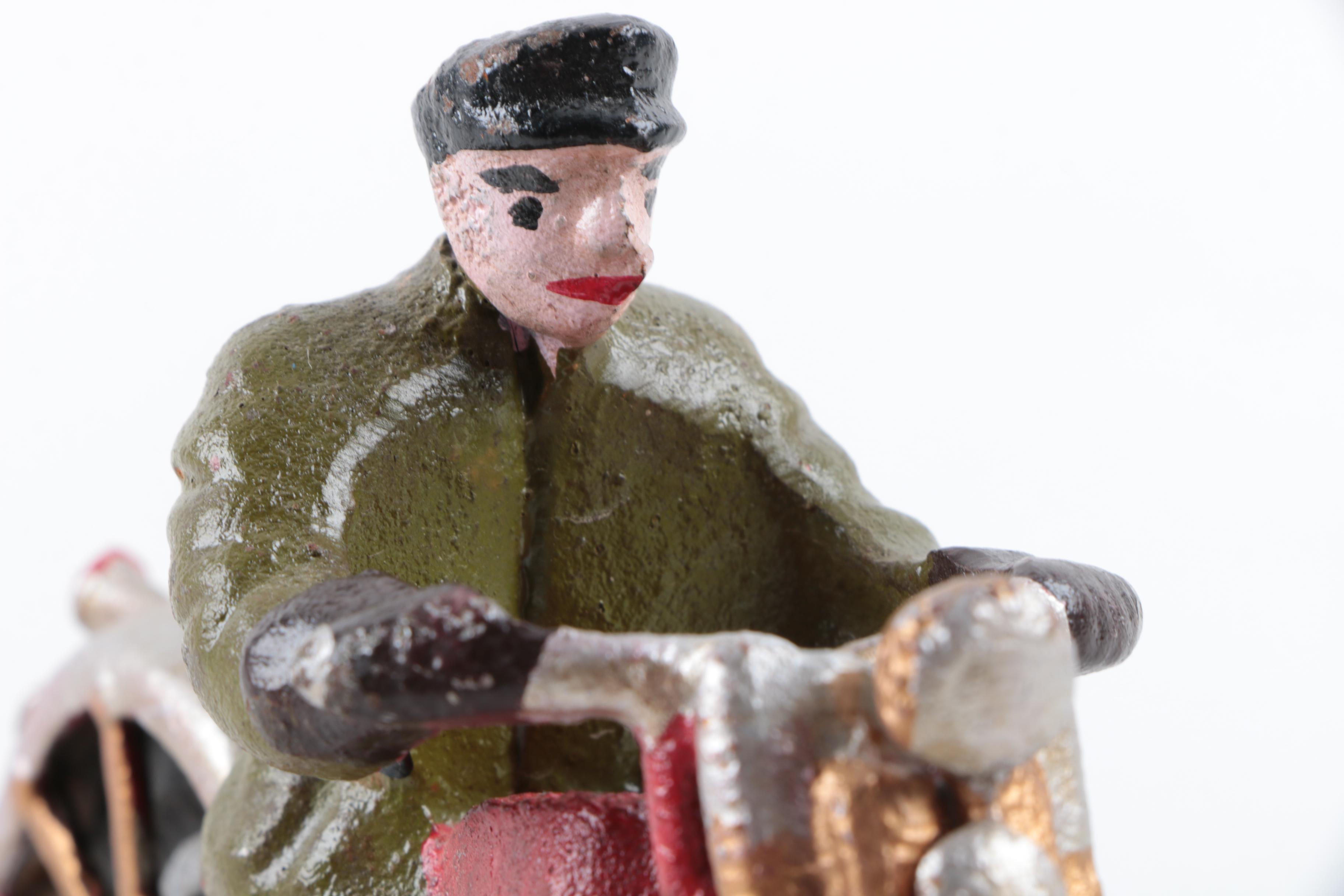 Cast Iron Motorcyclist Figurine