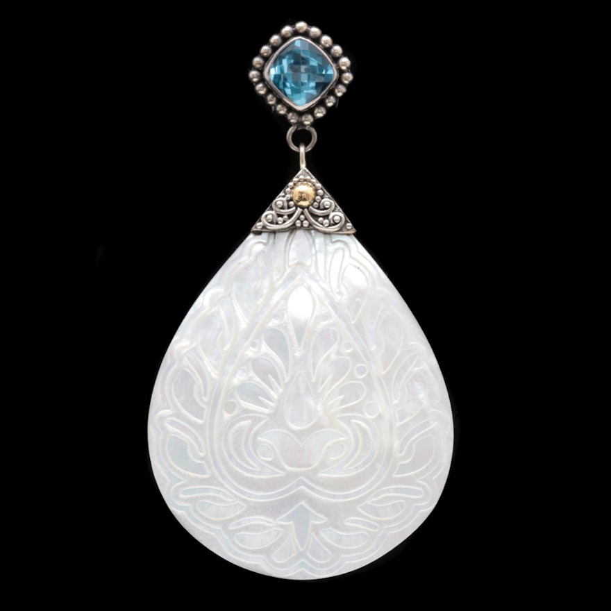 Sterling Silver, 18K Yellow Gold, Carved Mother of Pearl and Blue Topaz Pendant