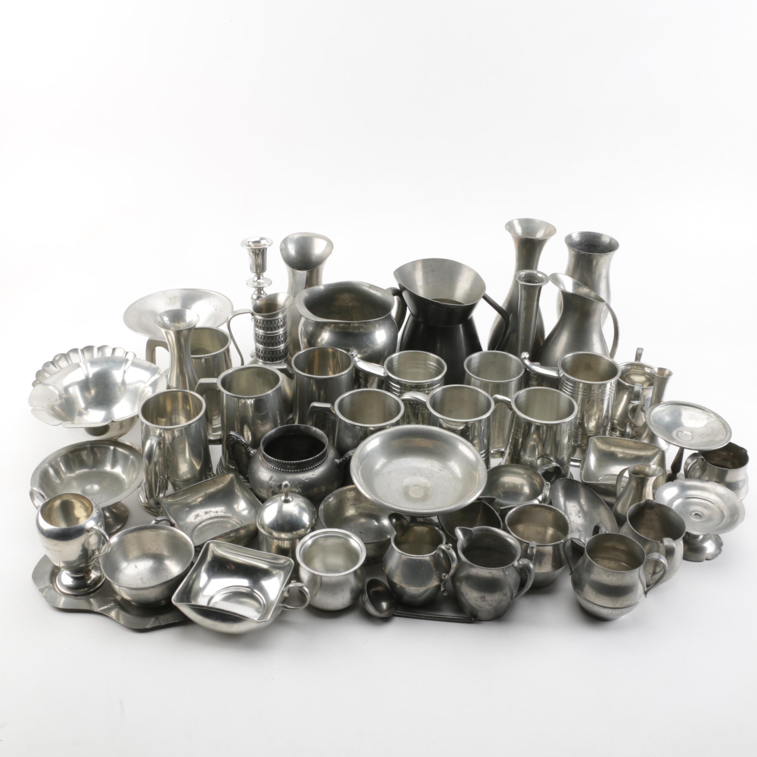 Large Assortment of Pewter Serveware Featuring Crescent Pewter