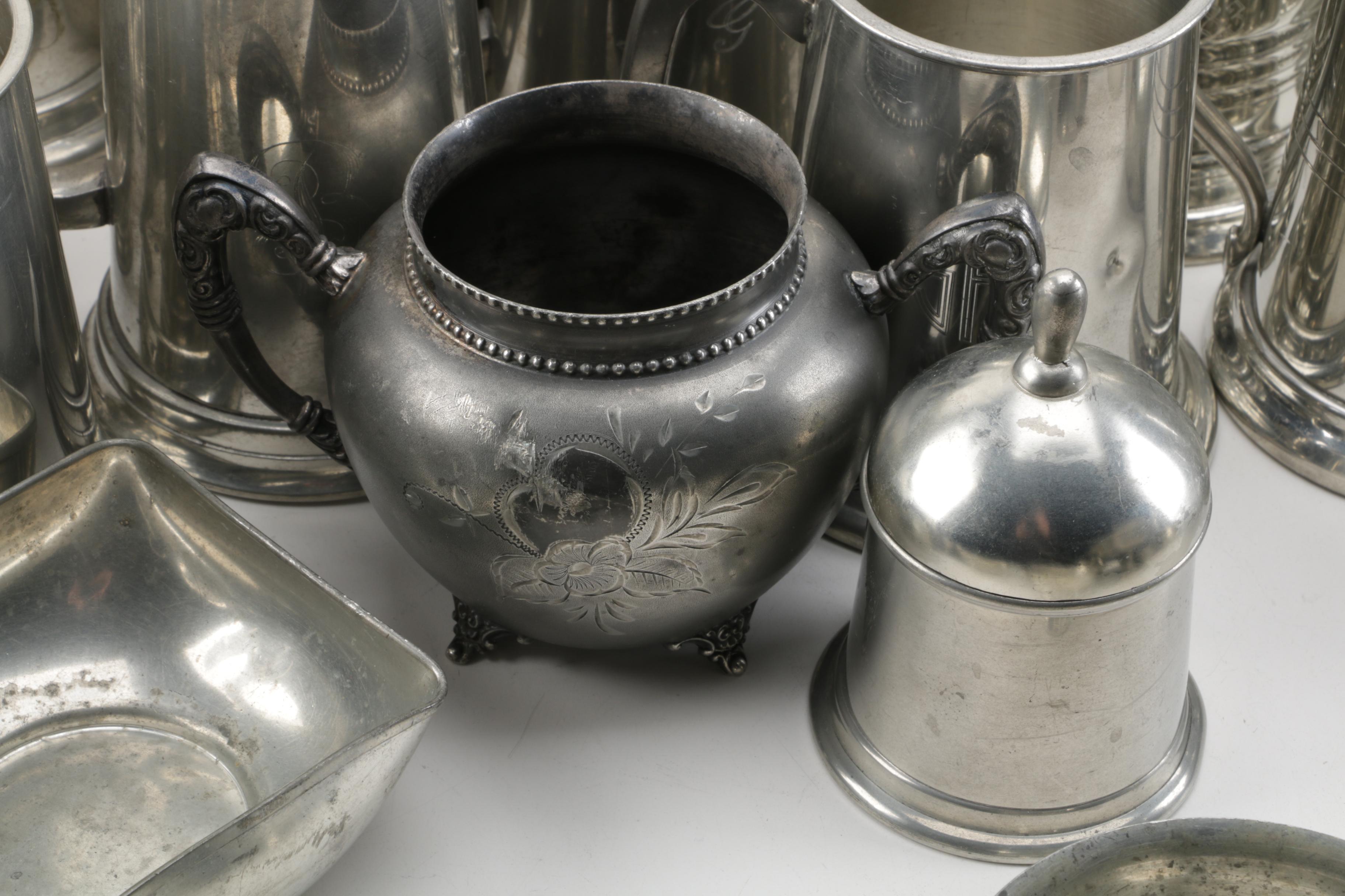 Large Assortment of Pewter Serveware Featuring Crescent Pewter